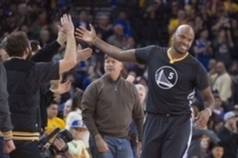 January 2, 2016; Oakland, CA, USA; Golden State Warriors center Marreese Speights (5) celebrates with fans during overtime against the Denver Nuggets at Oracle Arena. The Warriors defeated the Nuggets 111-108 in overtime. Mandatory Credit: Kyle Terada-USA