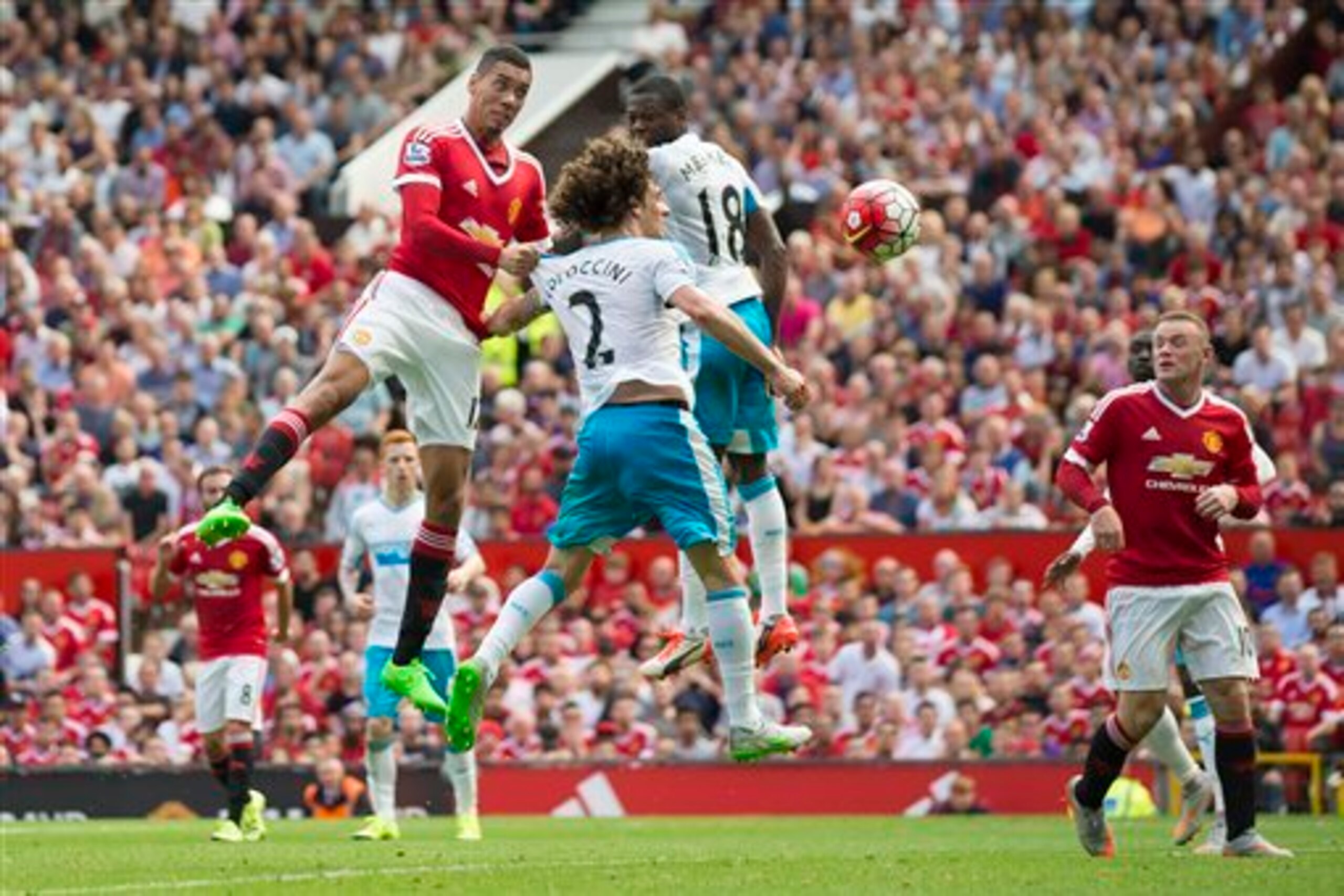 Coloccini and Mbemba in action at Old Trafford earlier this season.