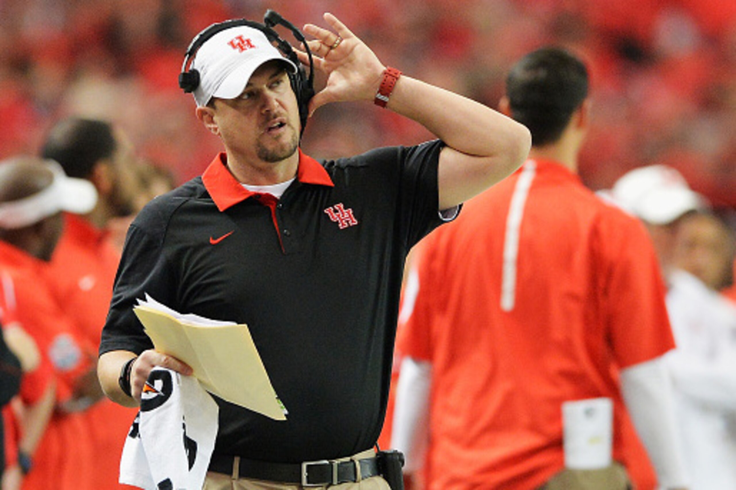 ATLANTA, GA - DECEMBER 31:  Head coach Tom Herman of the Houston Cougars reacts in the first quarter against the Florida State Seminoles during the Chick-fil-A Peach Bowl at the Georgia Dome on December 31, 2015 in Atlanta, Georgia.  (Photo by Grant Halve