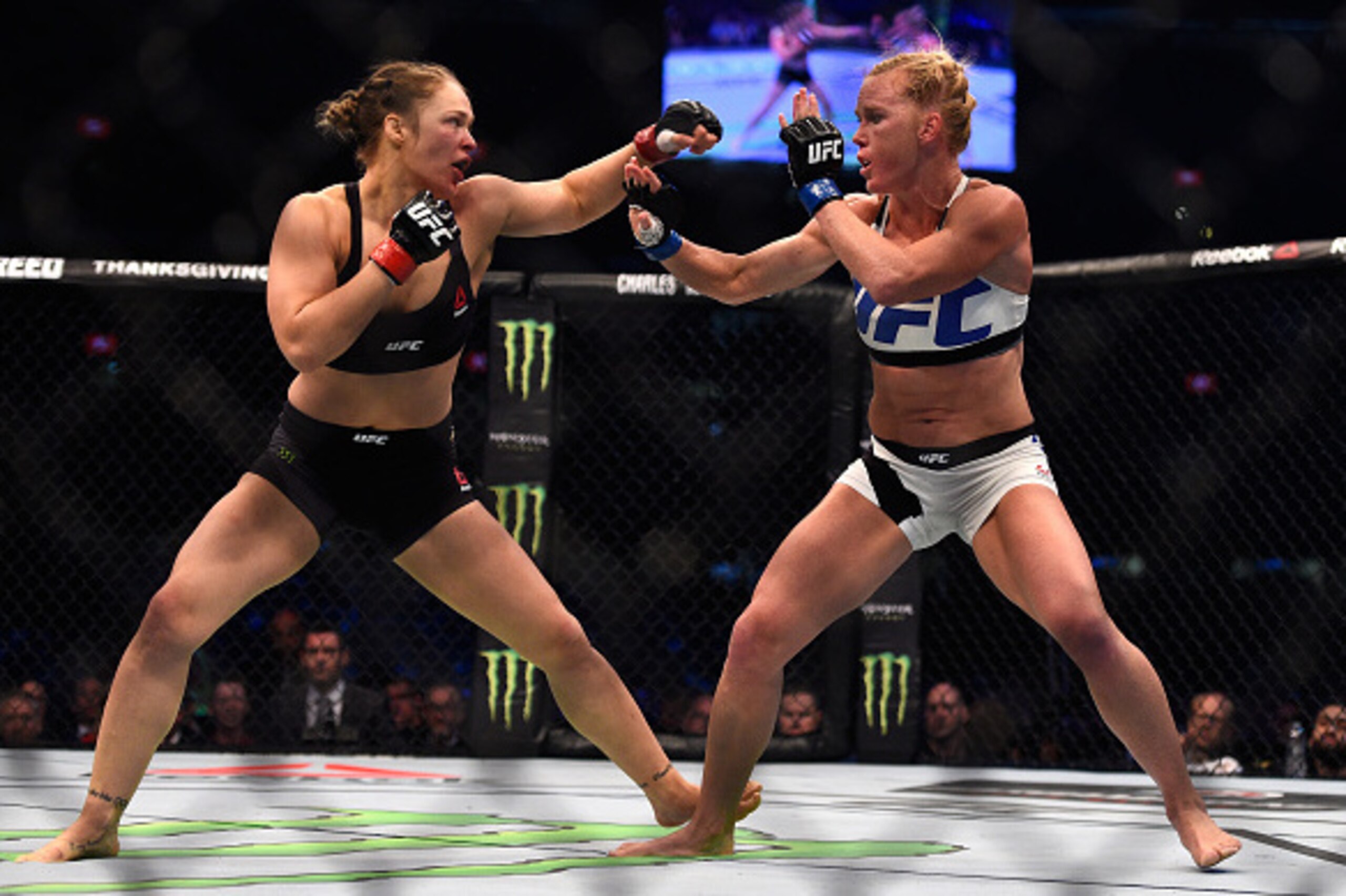MELBOURNE, AUSTRALIA - NOVEMBER 15:  (L-R) Ronda Rousey faces Holly Holm in their UFC women's bantamweight championship bout during the UFC 193 event at Etihad Stadium on November 15, 2015 in Melbourne, Australia. (Photo by Jeff Bottari/Zuffa LLC/Zuffa LL
