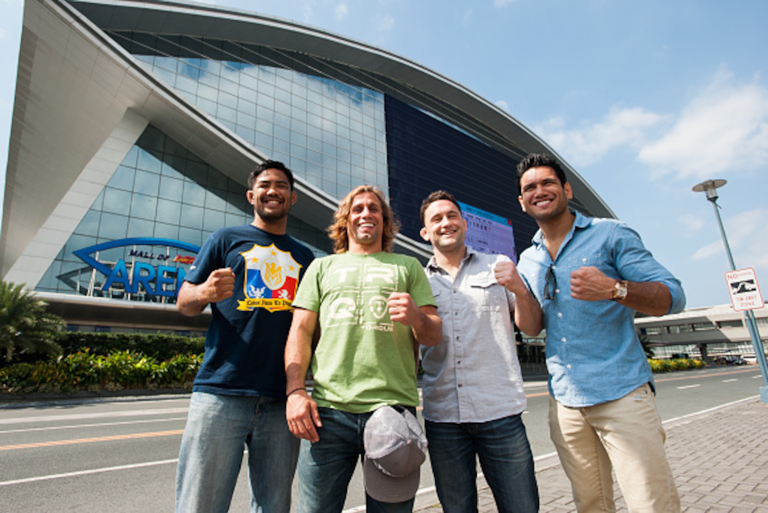 MANILA, PHILIPPINES - MARCH 10:  UFC fighters Uriah Faber, Frankie Edgar, Mark Munoz and Phillipe Nover pose outside the MOA arena grounds during the UFC Manila Press Conference on March 10, 2015 in Manila, Philippines.  (Photo by Dondi Tawatao/Getty Imag