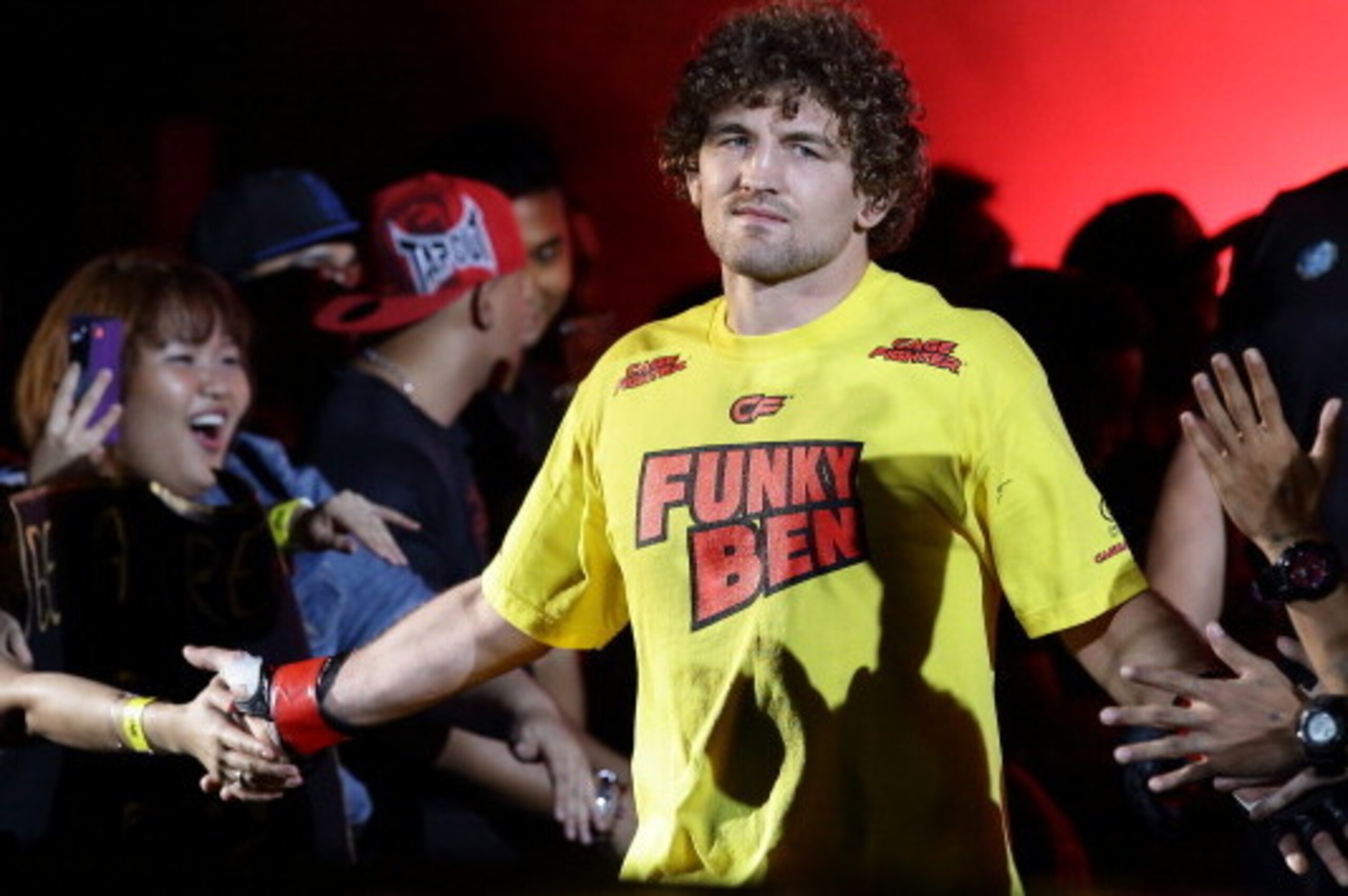 SINGAPORE - MAY 30:  Ben Askren of United States of America enters the ring during his fight against Bakhtiyar Abbasov of Azerbaijan during OneFC Honor & Glory at Singapore Indoor Stadium on May 30, 2014 in Singapore.  (Photo by Suhaimi Abdullah/Getty Ima