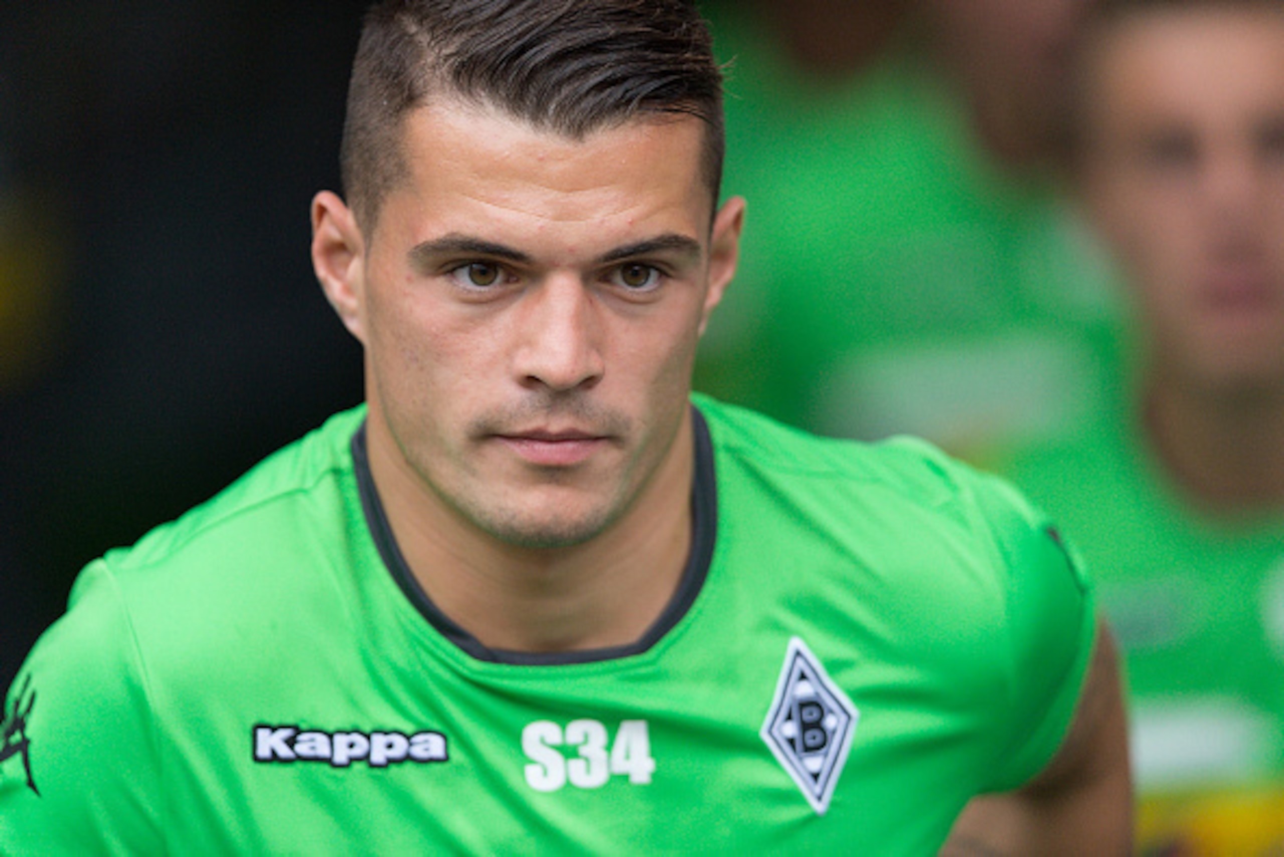 MOENCHENGLADBACH, GERMANY - AUGUST 23: Granit Xhaka (34) of Borussia Moenchengladbach entering the field for warmup at Borussia Park on August 23, 2015 in Moenchengladbach, Germany. (Photo by Oliver Kremer at Pixolli Studios/Getty Images) MOENCHENGLADBACH, GERMANY - AUGUST 23: Granit Xhaka (34) of Borussia Moenchengladbach entering the field for warmup at Borussia Park on August 23, 2015 in Moenchengladbach, Germany. (Photo by Oliver Kremer at Pixolli Studios/Getty Images)