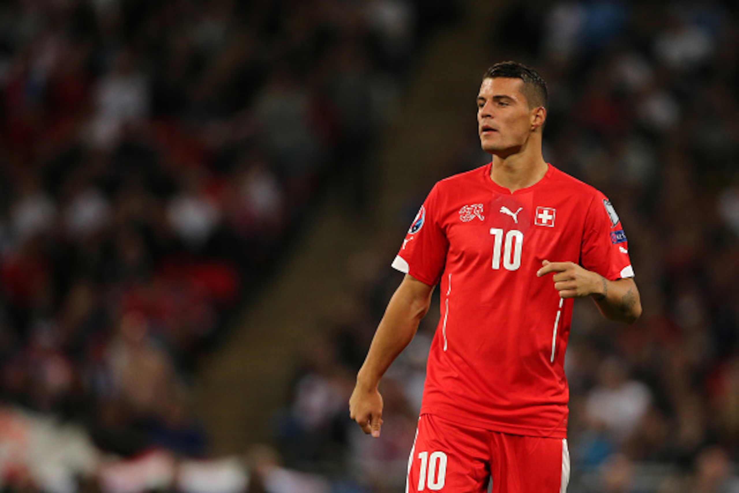 LONDON, ENGLAND - SEPTEMBER 08: Granit Xhaka of Switzerland during the UEFA EURO 2016 Qualifier Group E - England v Switzerland on September 8, 2015 in London, United Kingdom. (Photo by Matthew Ashton - AMA/Getty Images) LONDON, ENGLAND - SEPTEMBER 08: Granit Xhaka of Switzerland during the UEFA EURO 2016 Qualifier Group E - England v Switzerland on September 8, 2015 in London, United Kingdom. (Photo by Matthew Ashton - AMA/Getty Images)