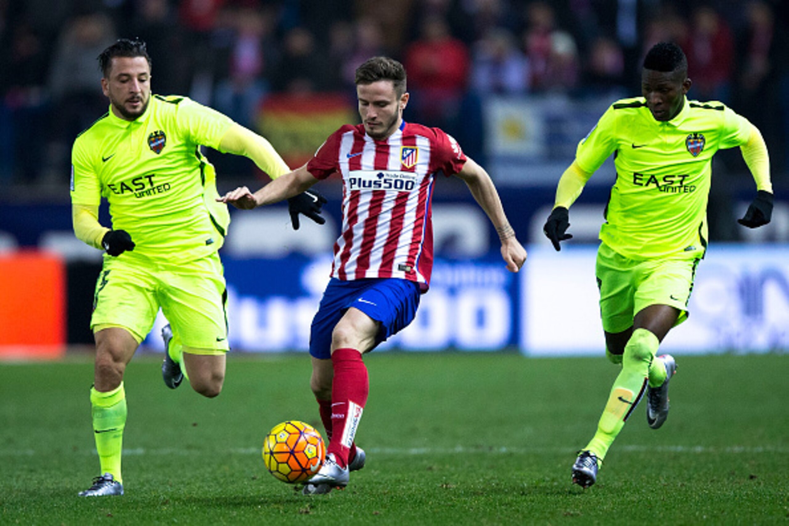 MADRID, SPAIN - JANUARY 02: Saul Niguez (2ndL) of Atletico de Madrid competes for the ball with Nabil Ghilas (L) of Levante UD and his teammate Jefferson Lerma (R) during the La Liga match between Club Atletico de Madrid and Levante UD at Vicente Caldero MADRID, SPAIN - JANUARY 02: Saul Niguez (2ndL) of Atletico de Madrid competes for the ball with Nabil Ghilas (L) of Levante UD and his teammate Jefferson Lerma (R) during the La Liga match between Club Atletico de Madrid and Levante UD at Vicente Caldero