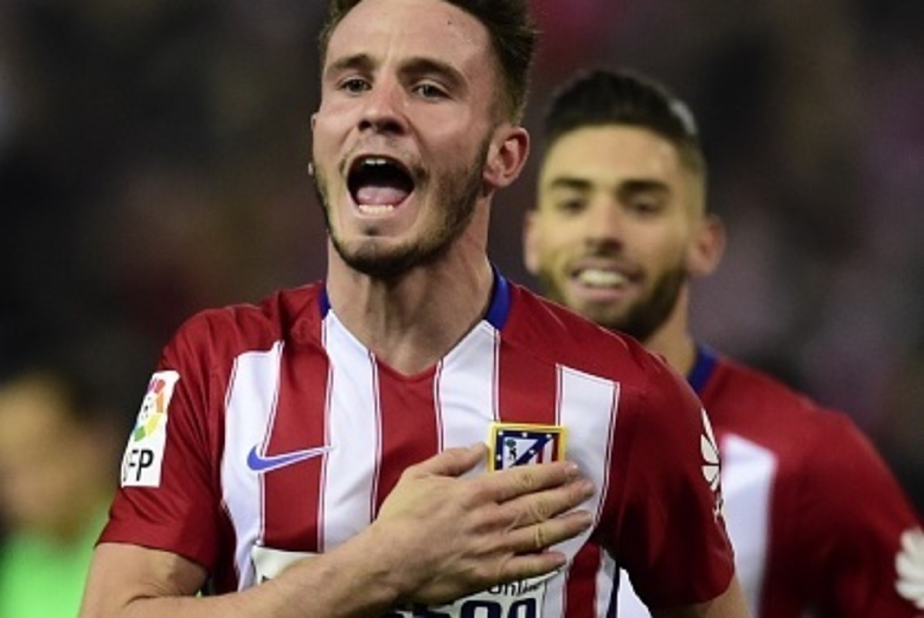 Atletico Madrid's midfielder Saul Niguez celebrates after scoring a goal during the Spanish league football match Club Atletico de Madrid vs Athletic Club Bilbao at the Vicente Calderon stadium in Madrid on December 13, 2015. AFP PHOTO / JAVIER SORIANO Atletico Madrid's midfielder Saul Niguez celebrates after scoring a goal during the Spanish league football match Club Atletico de Madrid vs Athletic Club Bilbao at the Vicente Calderon stadium in Madrid on December 13, 2015. AFP PHOTO / JAVIER SORIANO