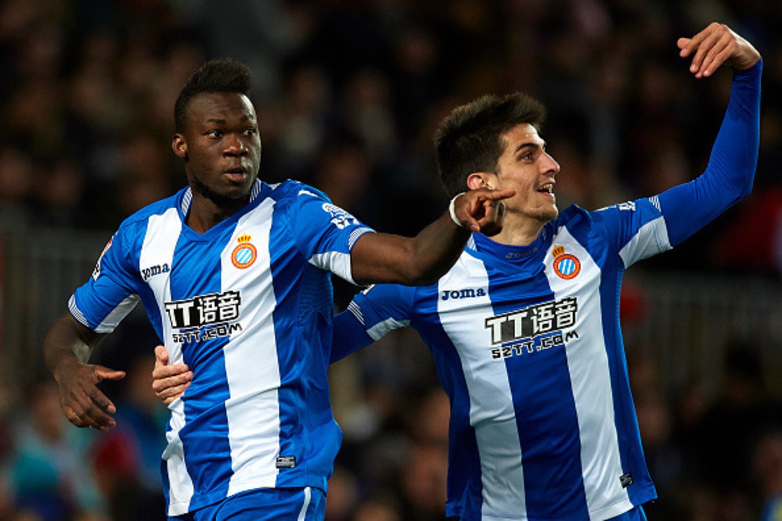 BARCELONA, SPAIN - JANUARY 06:  Felipe Caicedo (L) of Espanyol celebrates scoring his team's first goal with his teammate Gerard Moreno  during the Copa del Rey Round of 16 match between FC Barcelona and Real CD Espanyol at Camp Nou on January 6, 2016 in 