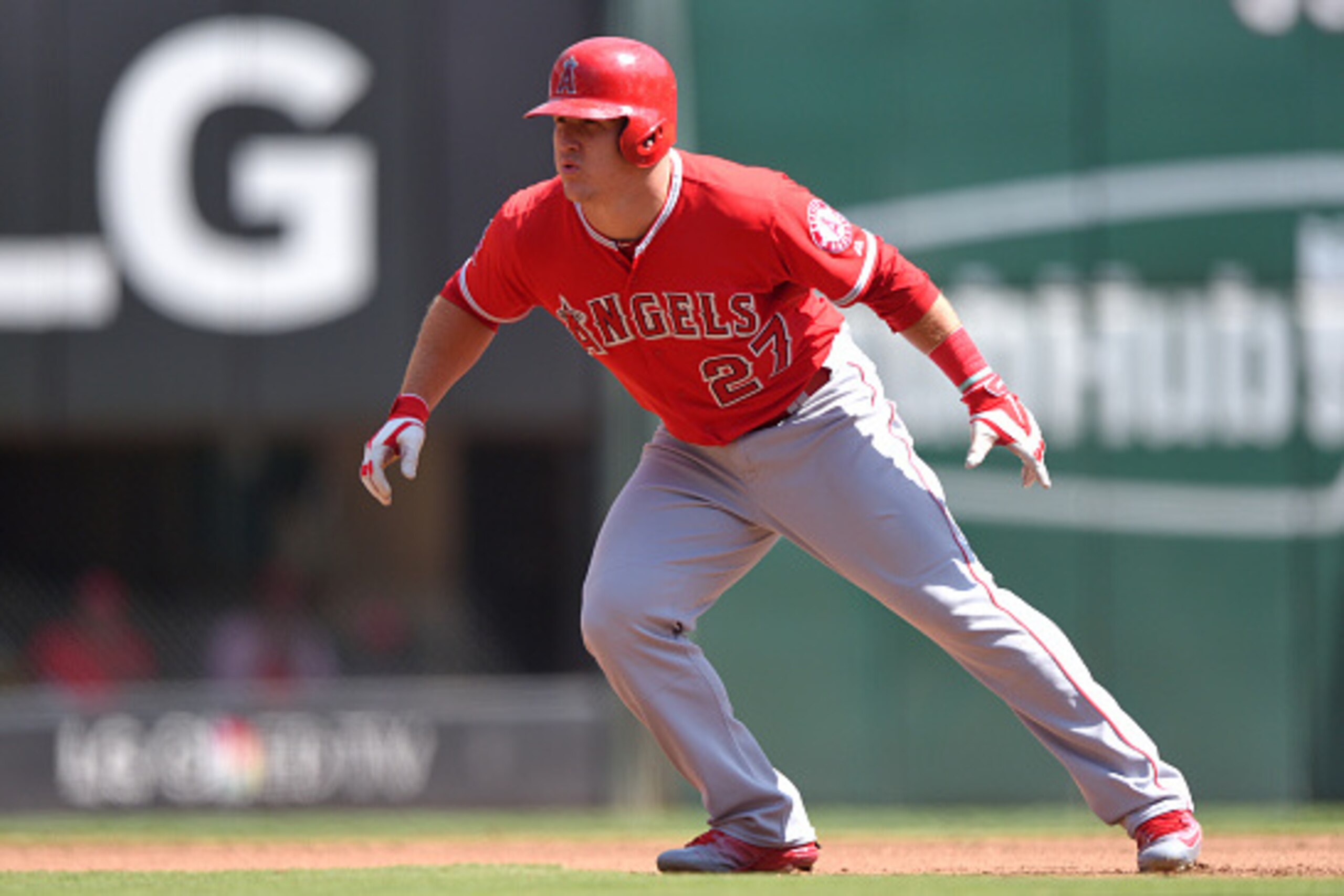 ARLINGTON, TX - OCTOBER 3: Mike Trout #27 of the Los Angeles Angels of Anaheim leads off during the fourth inning of the game against the Texas Rangers at Globe Life Park in Arlington on October 3, 2015 in Arlington, California. (Photo by Matt Brown/Angel