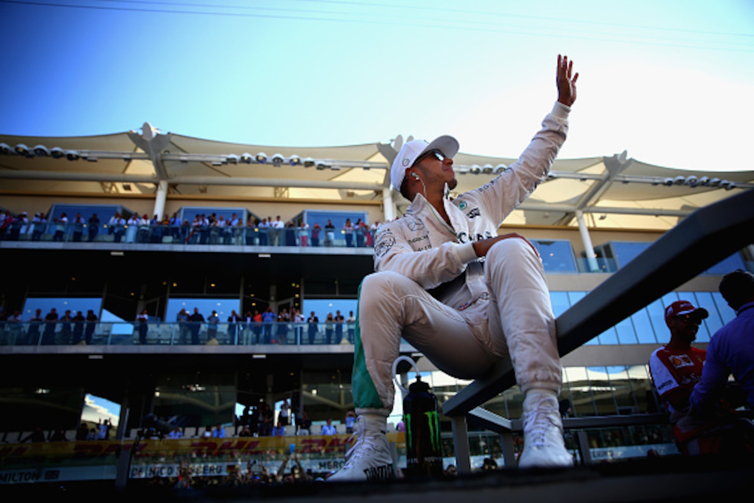 ABU DHABI, UNITED ARAB EMIRATES - NOVEMBER 29:  Lewis Hamilton of Great Britain and Mercedes GP takes part in the drivers' parade before the Abu Dhabi Formula One Grand Prix at Yas Marina Circuit on November 29, 2015 in Abu Dhabi, United Arab Emirates.  (