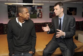 NEW YORK - MAY 18:  (EXCLUSIVE) Cultural icon and Nets investor JAY-Z and Nets owner Mikhail Prokhorov celebrate Prokhorov's purchase of the team at lunch today at JAY-Z's 40/40 club on May 18, 2010 in New York City. Prokhorov is representing the Nets ton
