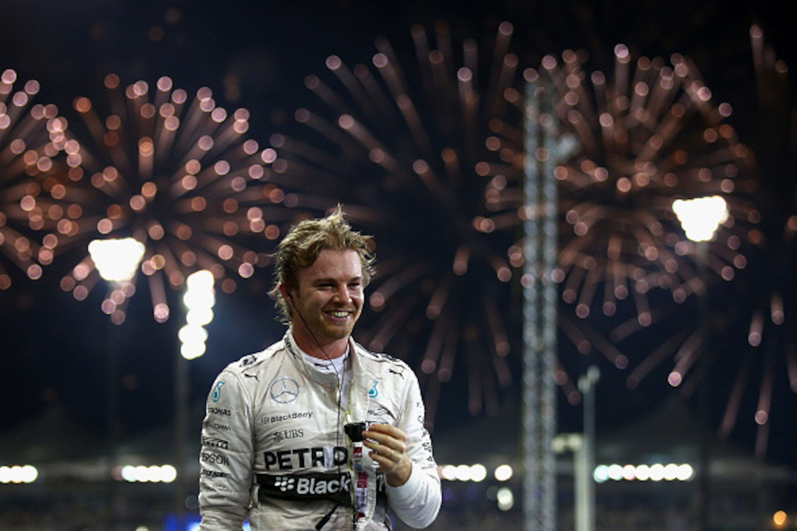 ABU DHABI, UNITED ARAB EMIRATES - NOVEMBER 29:  Nico Rosberg of Germany and Mercedes GP celebrates in Parc Ferme after winning the Abu Dhabi Formula One Grand Prix at Yas Marina Circuit on November 29, 2015 in Abu Dhabi, United Arab Emirates.  (Photo by P