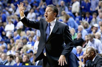 LEXINGTON, KY - DECEMBER 26:  John Calipari the head coach of the Kentucky Wildcats gives instructions to his team in the 75-73 win over the Louisville Cardinals at Rupp Arena on December 26, 2015 in Lexington, Kentucky.  (Photo by Andy Lyons/Getty Images
