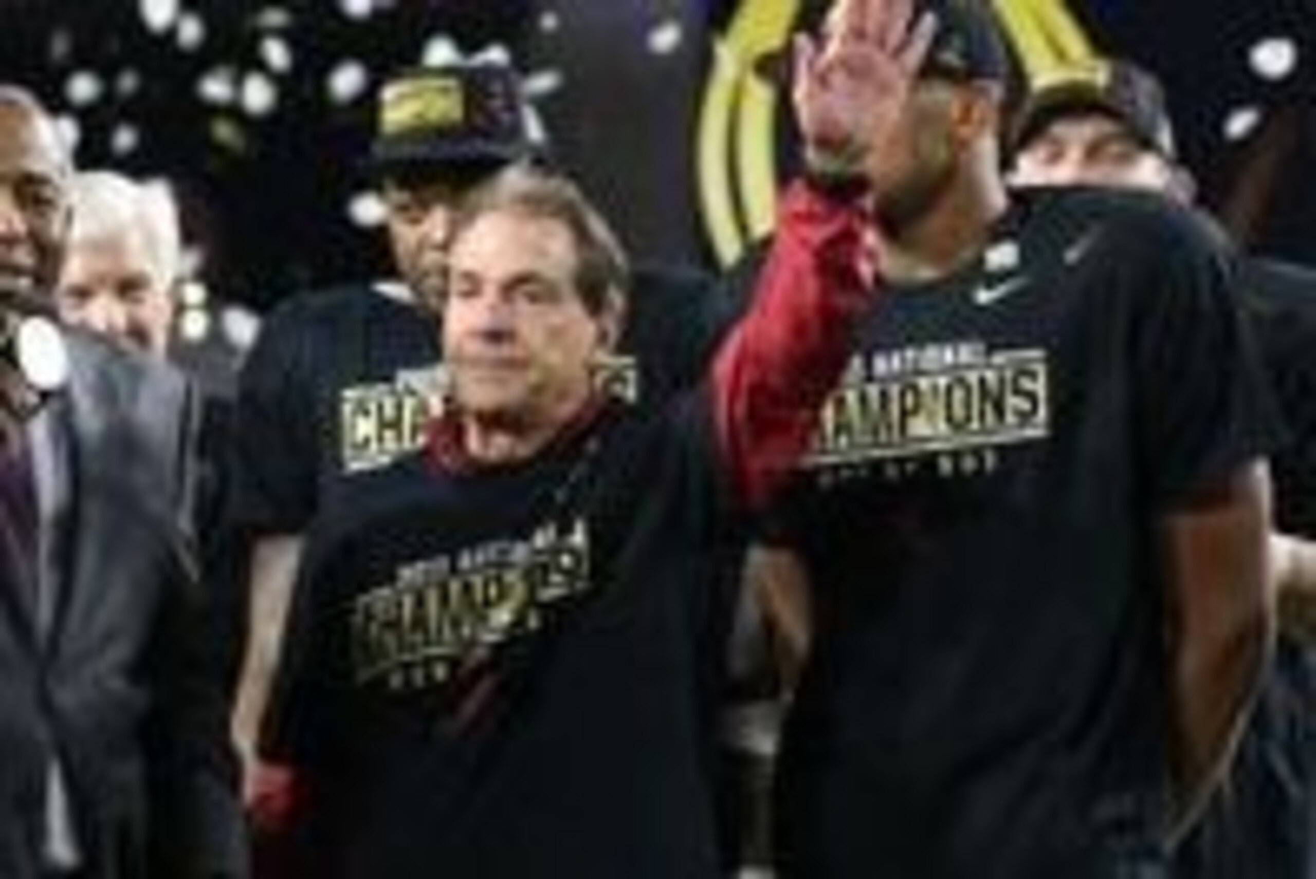Jan 11, 2016; Glendale, AZ, USA; Alabama Crimson Tide head coach Nick Saban waves during the trophy ceremony after the game against the Clemson Tigers in the 2016 CFP National Championship at University of Phoenix Stadium. Alabama won 45-40. Mandatory Cre