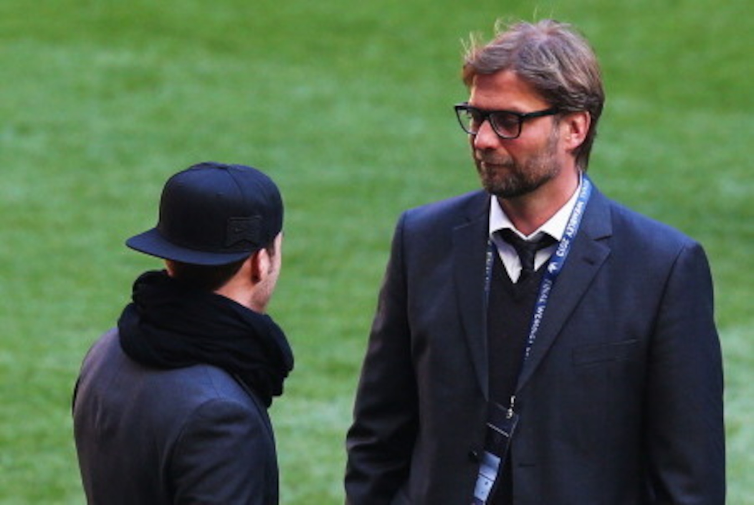 LONDON, ENGLAND - MAY 25:  Mario Gotze of Borussia Dortmund (L) speaks with Head Coach Jurgen Klopp ahead of the UEFA Champions League final match between Borussia Dortmund and FC Bayern Muenchen at Wembley Stadium on May 25, 2013 in London, United Kingdo