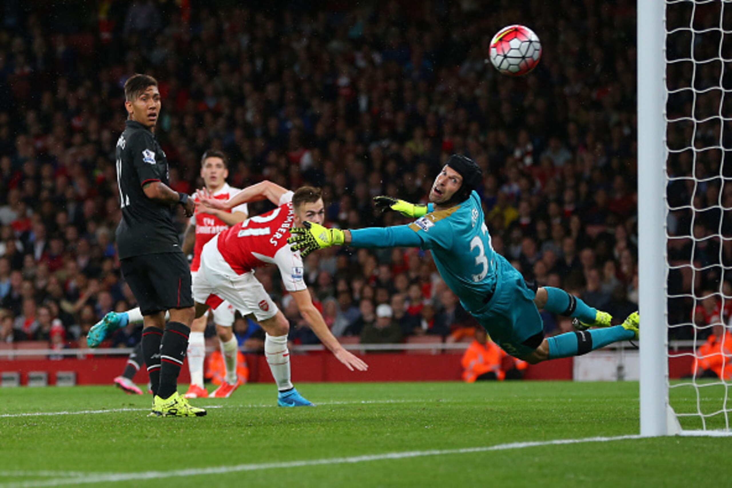 LONDON, ENGLAND - AUGUST 24:  Petr Cech of Arsenal looks back after he saves from Philippe Coutinho of Liverpool during the Barclays Premier League match between Arsenal and Liverpool at the Emirates Stadium on August 24, 2015 in London, United Kingdom.  