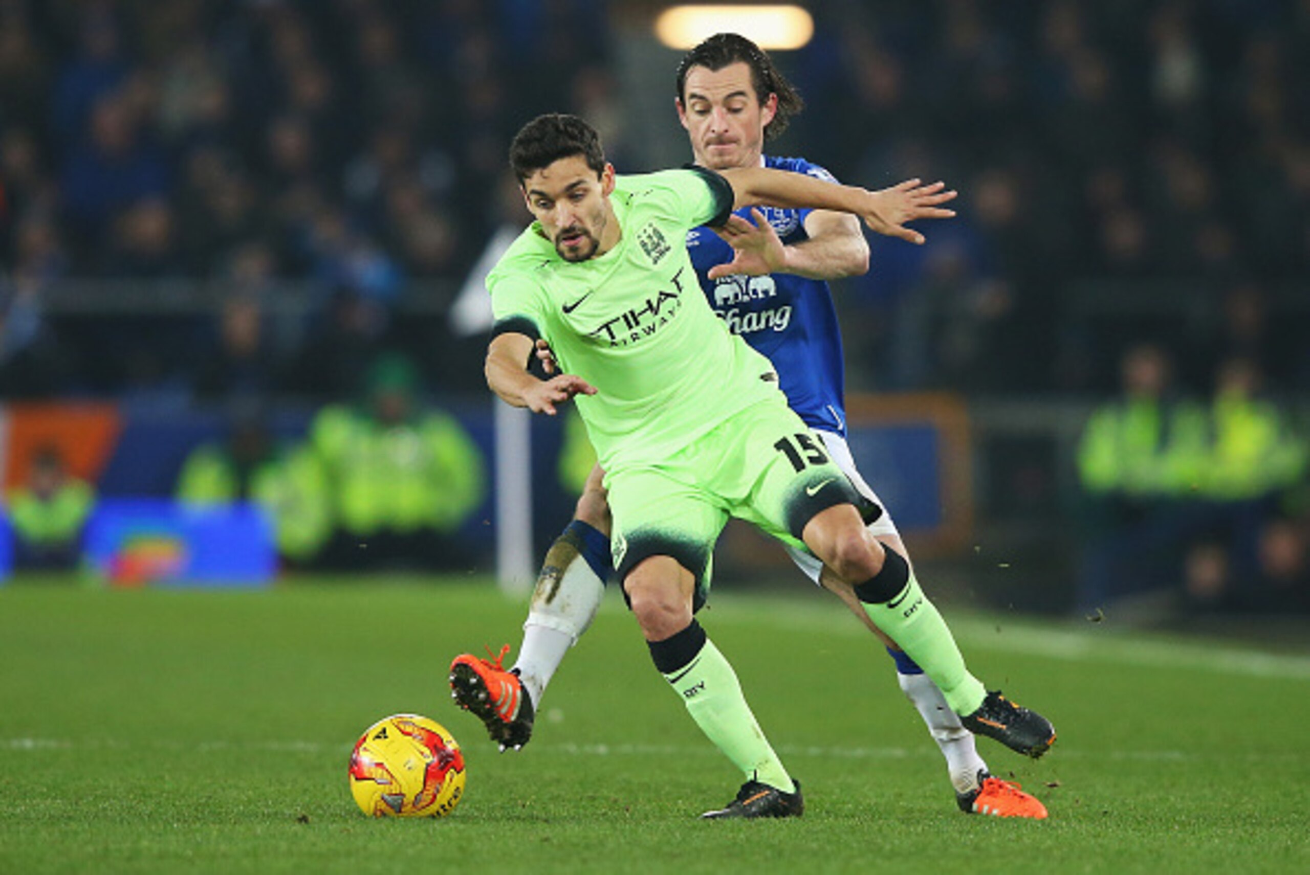 LIVERPOOL, ENGLAND - JANUARY 06:  Jesus Navas of Manchester City is challenged by Leighton Baines of Everton during the Capital One Cup Semi Final First Leg match between Everton and Manchester City at Goodison Park on January 6, 2016 in Liverpool, Englan