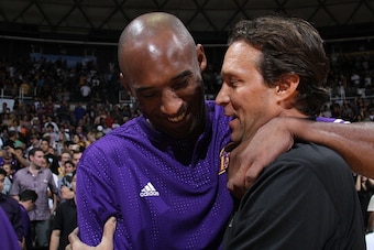 HONOLULU, HI - OCTOBER 6:  Kobe Bryant #24 of the Los Angeles Lakers is greeted by Head Coach Quin Snyder of the Utah Jazz during a preseason game on October 6, 2015 at the Stan Sheriff Center in Honolulu, Hawaii. NOTE TO USER: User expressly acknowledges
