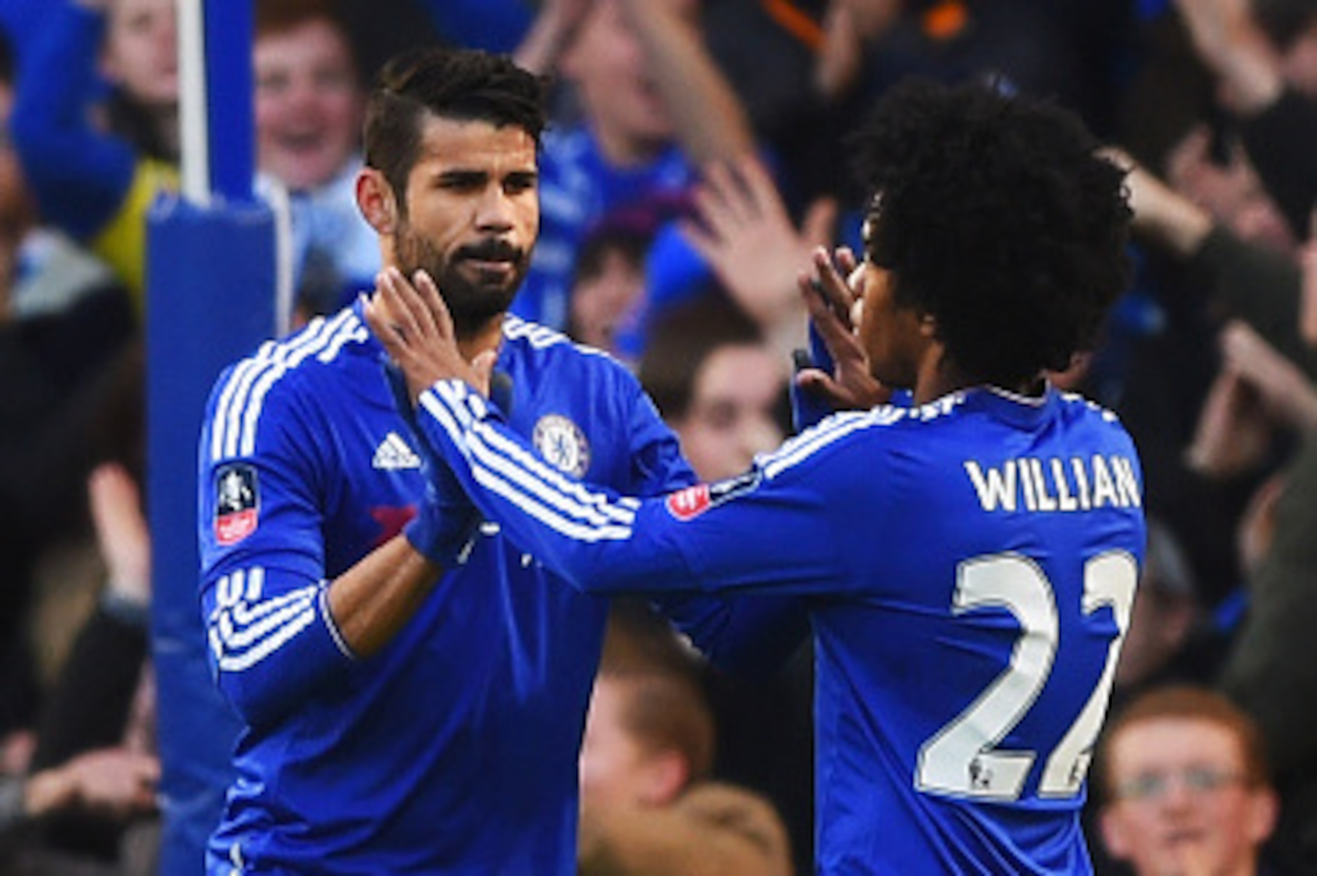 LONDON, ENGLAND - JANUARY 10:  Diego Costa of Chelsea (L) celebrates with Willian as he scores their first goal during the Emirates FA Cup third round match between Chelsea and Scunthorpe United at Stamford Bridge on January 10, 2016 in London, England.  