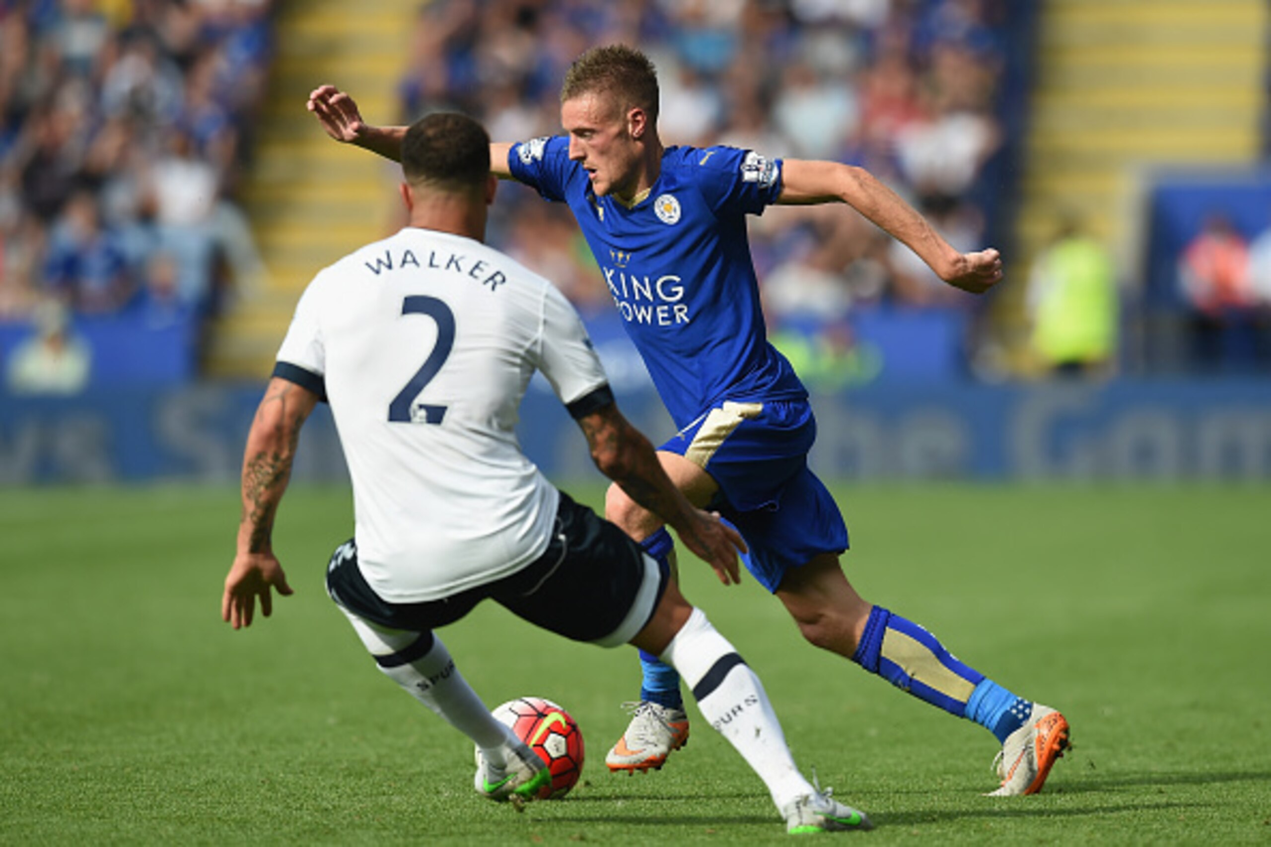 LEICESTER, ENGLAND - AUGUST 22: Jamie Vardy of Leicester City and Kyle Walker of Tottenham Hotspur compete for the ball during the Barclays Premier League match between Leicester City and Tottenham Hotspur at The King Power Stadium on August 22, 2015 in L