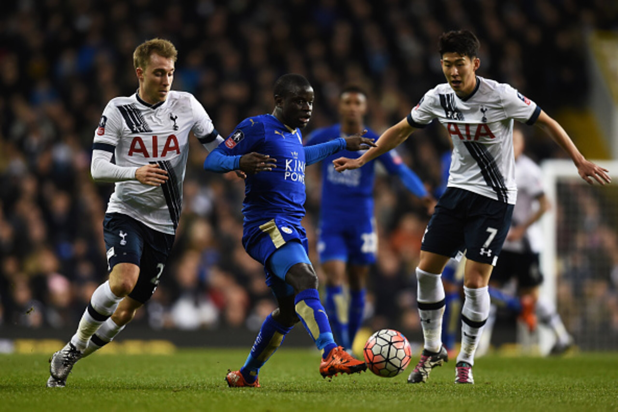 LONDON, ENGLAND - JANUARY 10:  Ngolo Kante of Leicester City is closed down by Christian Eriksen (L) of Spurs and Son Heung-Min (R) of Spurs during The Emirates FA Cup third round match between Tottenham Hotspur and Leicester City at White Hart Lane on Ja
