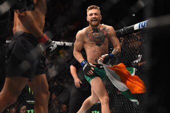 LAS VEGAS, NEVADA - DECEMBER 12:  Conor McGregor of Ireland celebrates after defeating Jose Aldo of Brazil in their featherweight championship bout during the UFC 194 event inside MGM Grand Garden Arena on December 12, 2015 in Las Vegas, Nevada.  (Photo b