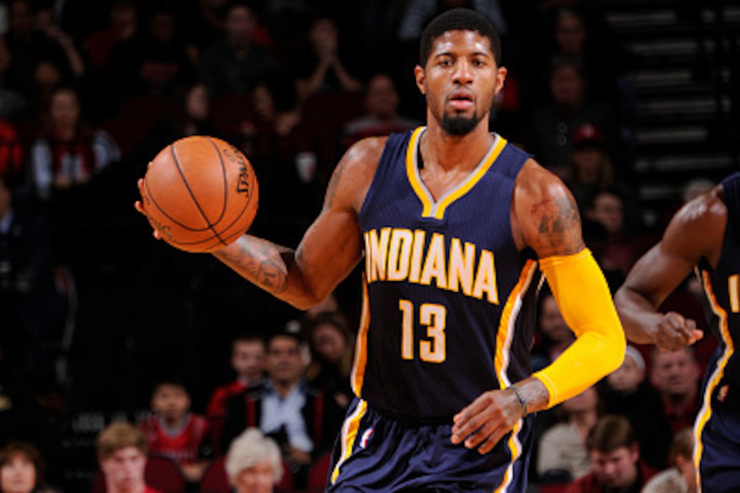 HOUSTON, TX - JANUARY 10: Paul George #13 of the Indiana Pacers handles the ball against the Houston Rockets on January 10, 2016 at the Toyota Center in Houston, Texas. NOTE TO USER: User expressly acknowledges and agrees that, by downloading and or using