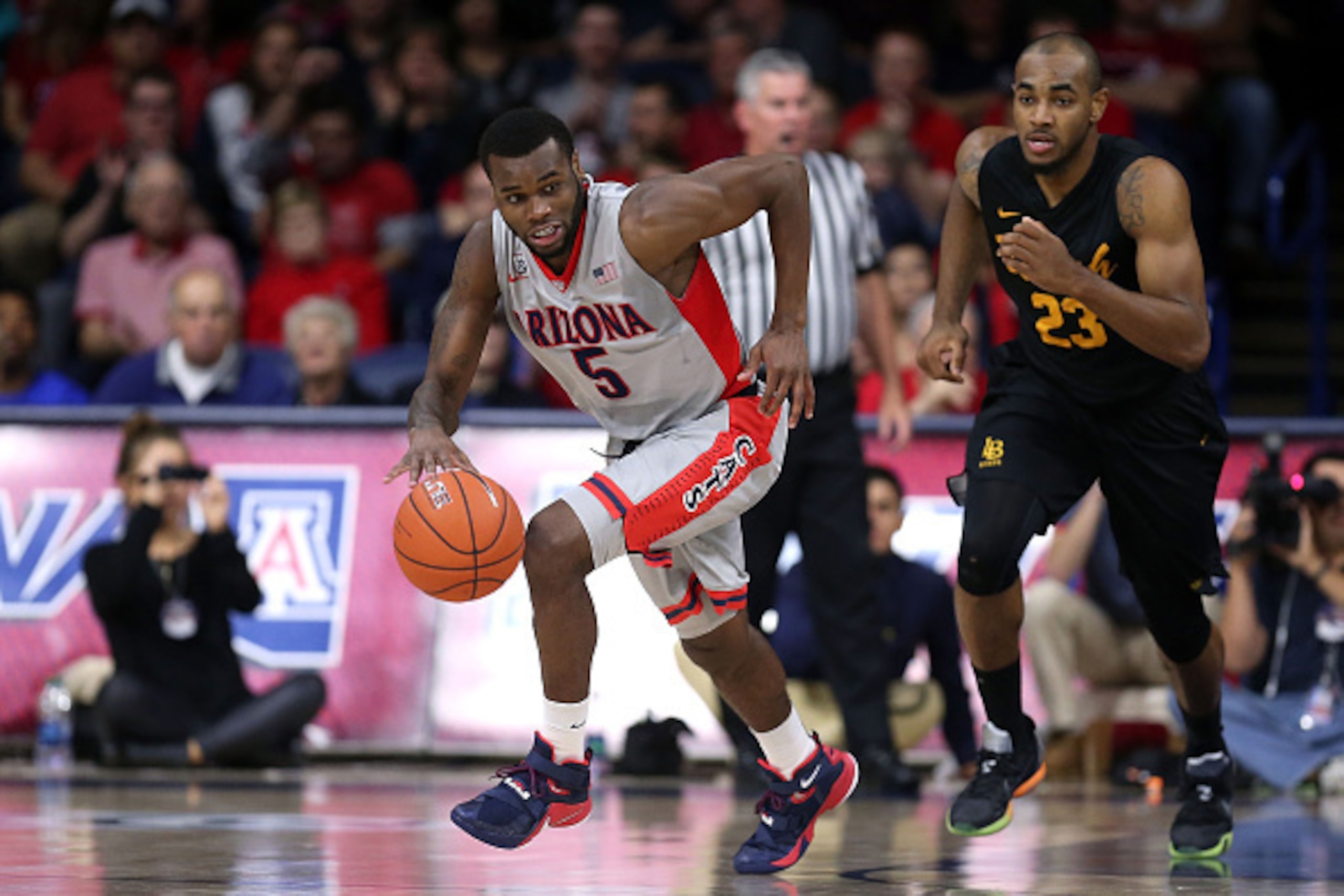 TUCSON, AZ - DECEMBER 22: Kadeem Allen #5 of the Arizona Wildcats runs up the floor during the first half of the college basketball game at McKale Center on December 22, 2015 in Tucson, Arizona. The Arizona Wildcats beat the Long Beach State 49ers 85-70. 