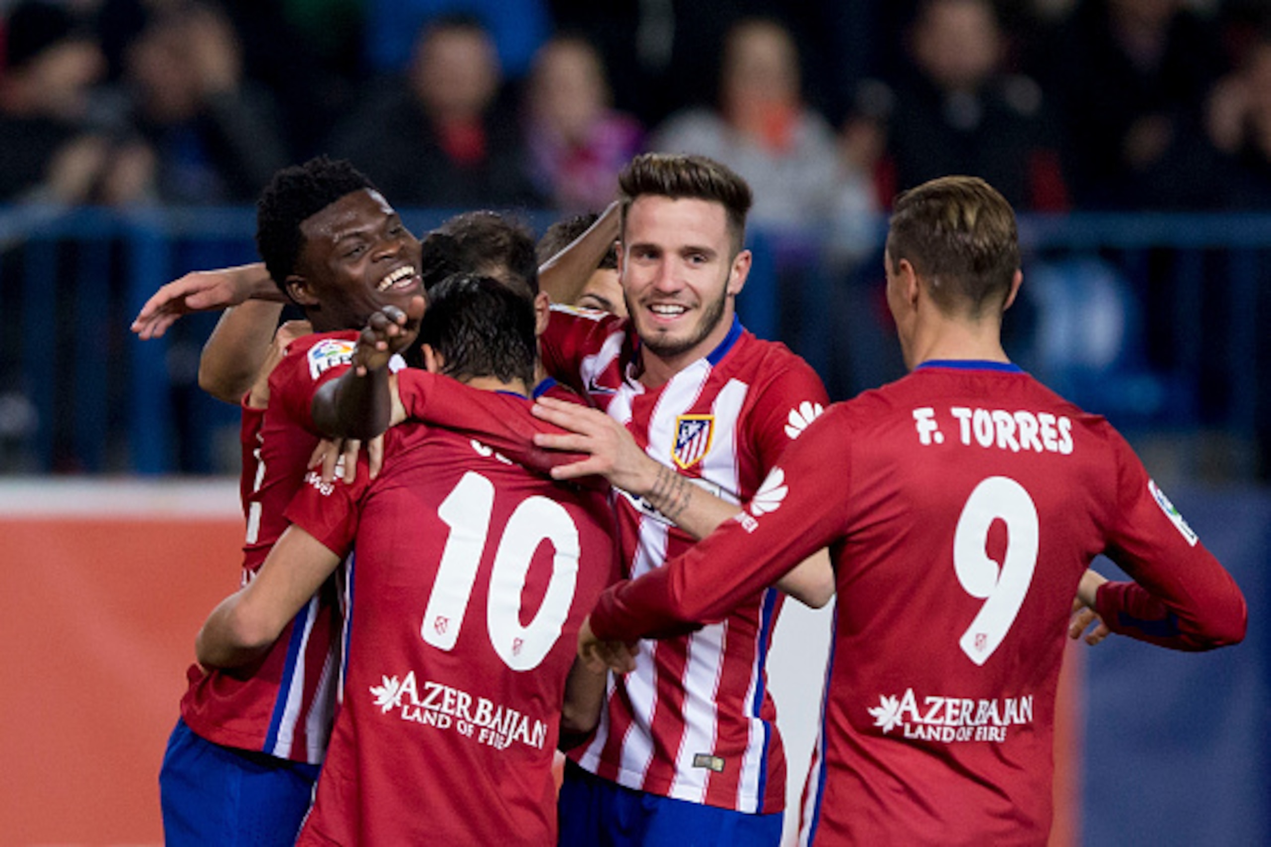 MADRID, SPAIN - DECEMBER 17: Thomas Teye Partey (L) of Atletico de Madrid celebrates scoring their opening goal with teammates during the Copa del Rey Round of 32 match between Club Atletico Madrid and CF Reus Deportiu at Vicente Claderon stadium on Decem