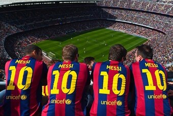 BARCELONA, SPAIN - MARCH 08: FC Barcelona supporters wearing Lionel Messi shirts watch the game from the stands during the La Liga match between FC Barcelona and Rayo Vallecano de Madrid at Camp Nou on March 8, 2015 in Barcelona, Spain.  (Photo by David R