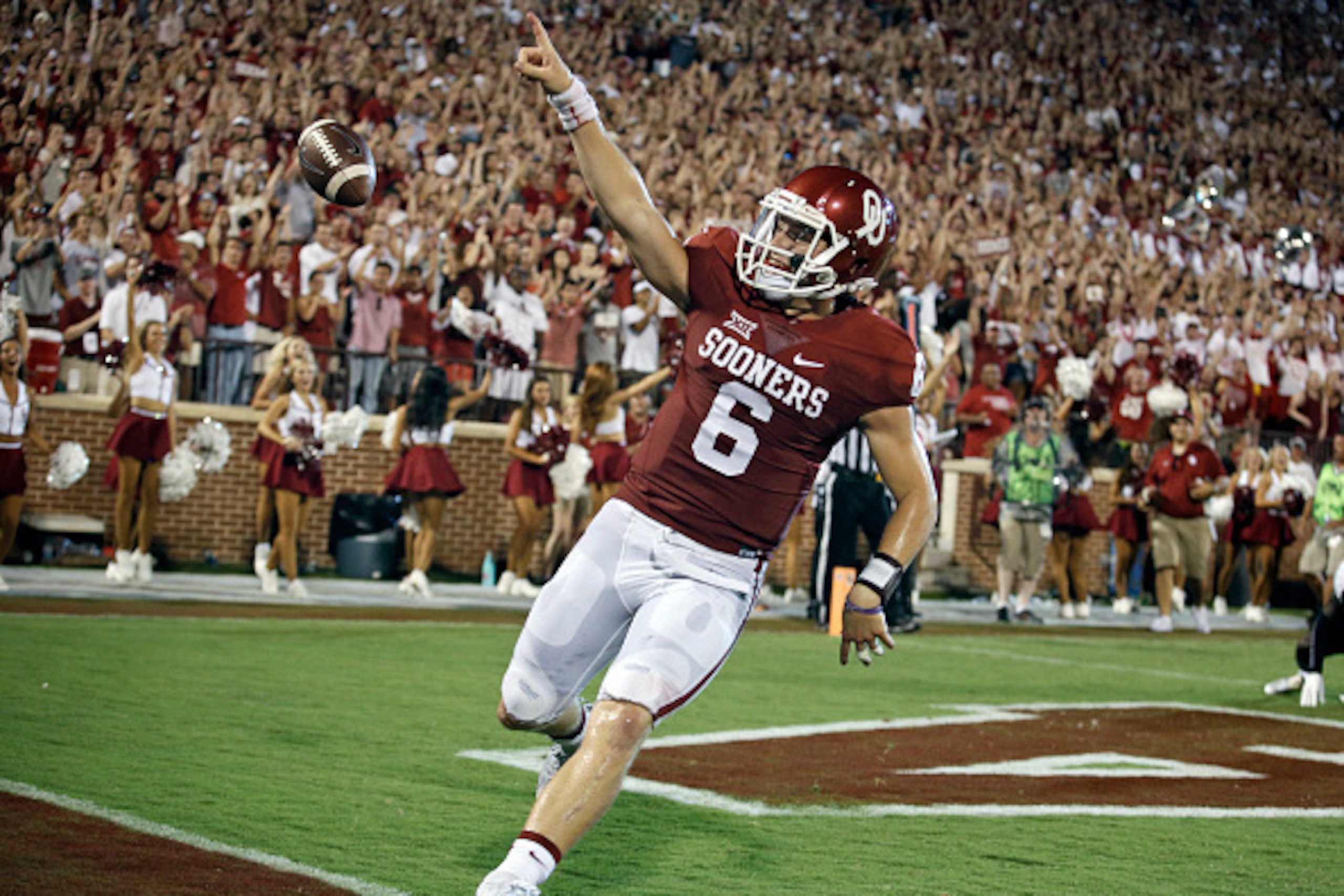 NORMAN, OK - SEPTEMBER 5:  Quarterback Baker Mayfield #6 of the Oklahoma Sooners celebrates a touchdown against the Akron Zips September 5, 2015 at Gaylord Family-Oklahoma Memorial Stadium in Norman, Oklahoma. Oklahoma defeated Akron 41-3.(Photo by Brett 