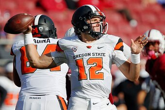PALO ALTO, CA - OCTOBER 25:  Quarterback Luke Del Rio #12 of the Oregon State Beavers throws against the Stanford Cardinal in the fourth quarter on October 25, 2014 at Stanford Stadium in Palo Alto, California.  Stanford won 38-14.  (Photo by Brian Bahr/G