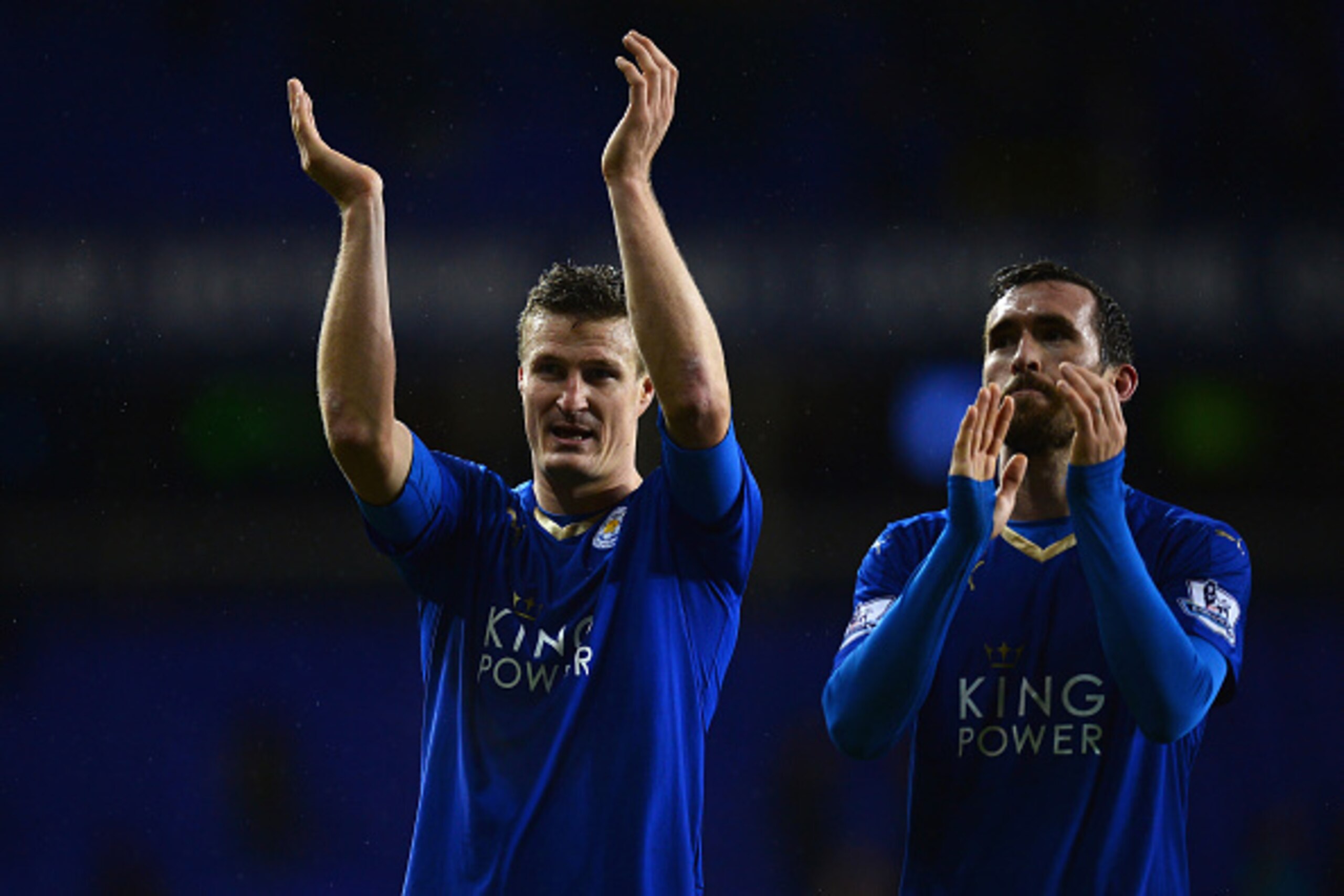 LONDON, ENGLAND - JANUARY 13: Robert Huth (L) and Christian Fuchs (R) of Leicester City applaud the supporters after their team's 1-0 win in the Barclays Premier League match between Tottenham Hotspur and Leicester City at White Hart Lane on January 13, LONDON, ENGLAND - JANUARY 13: Robert Huth (L) and Christian Fuchs (R) of Leicester City applaud the supporters after their team's 1-0 win in the Barclays Premier League match between Tottenham Hotspur and Leicester City at White Hart Lane on January 13,