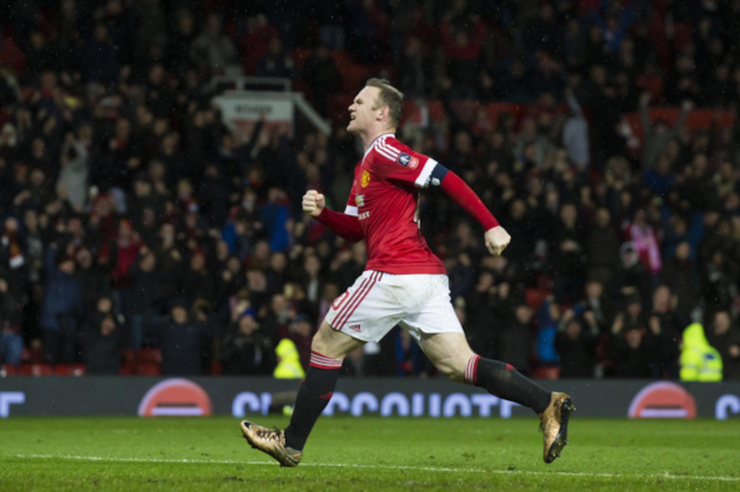 Rooney celebrates his penalty winner against Sheffield United.