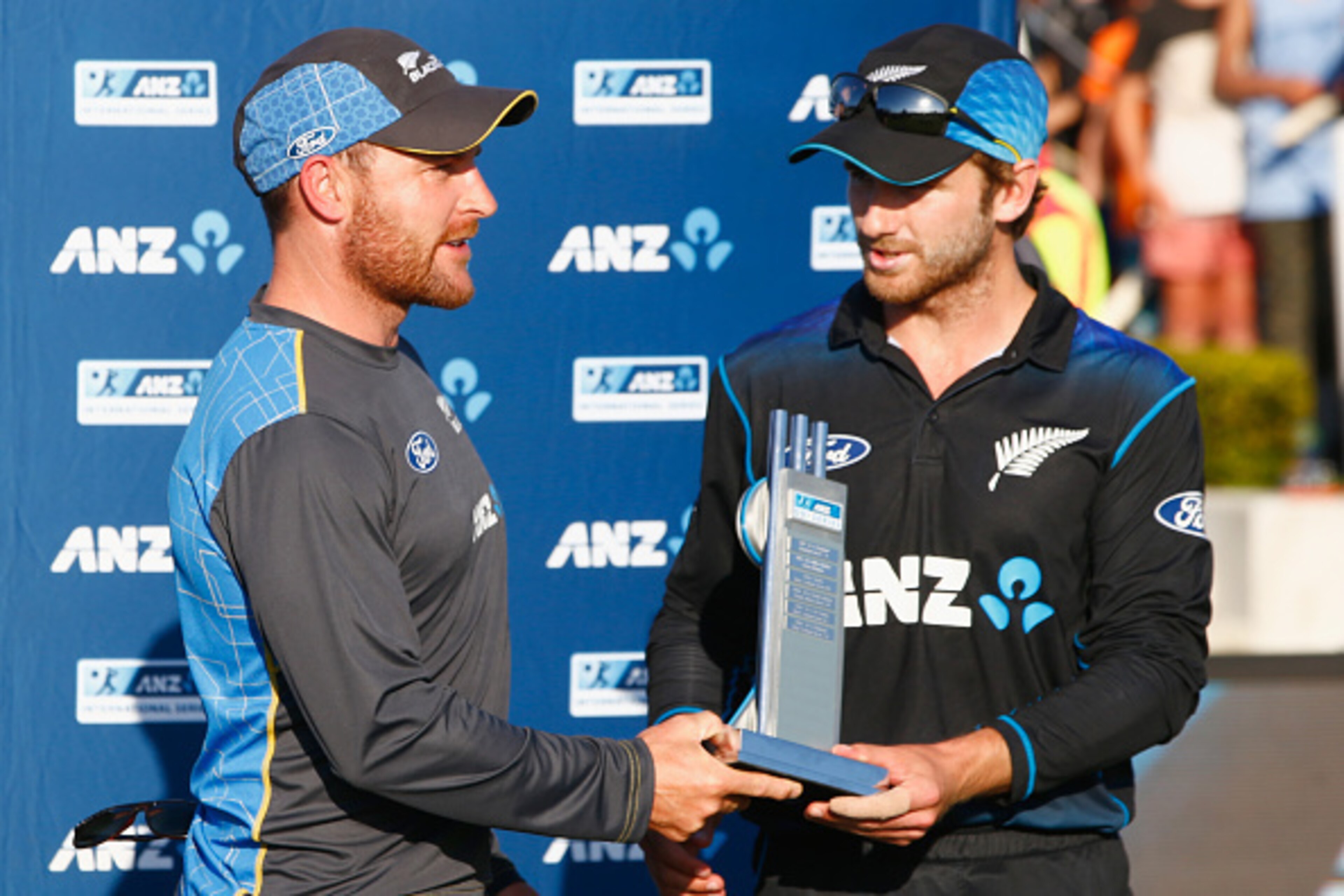 MOUNT MAUNGANUI, NEW ZEALAND - JANUARY 05: Series captains Brendon McCullum (L) and Kane Williamson (R) receive the winning trophy during game five of the One Day International series between New Zealand and Sri Lanka at Bay Oval on January 5, 2016 in Mou
