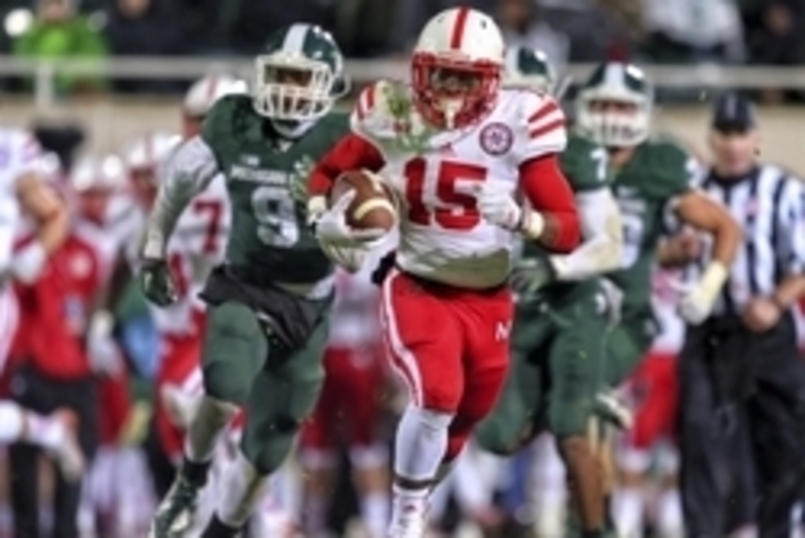 Oct 4, 2014; East Lansing, MI, USA; Nebraska Cornhuskers wide receiver De'Mornay Pierson-El (15) runs back a punt for a touchdown against the Michigan State Spartans during the 2nd half of a game at Spartan Stadium. Mandatory Credit: MSU won 27-22. Mike C Oct 4, 2014; East Lansing, MI, USA; Nebraska Cornhuskers wide receiver De'Mornay Pierson-El (15) runs back a punt for a touchdown against the Michigan State Spartans during the 2nd half of a game at Spartan Stadium. Mandatory Credit: MSU won 27-22. Mike C