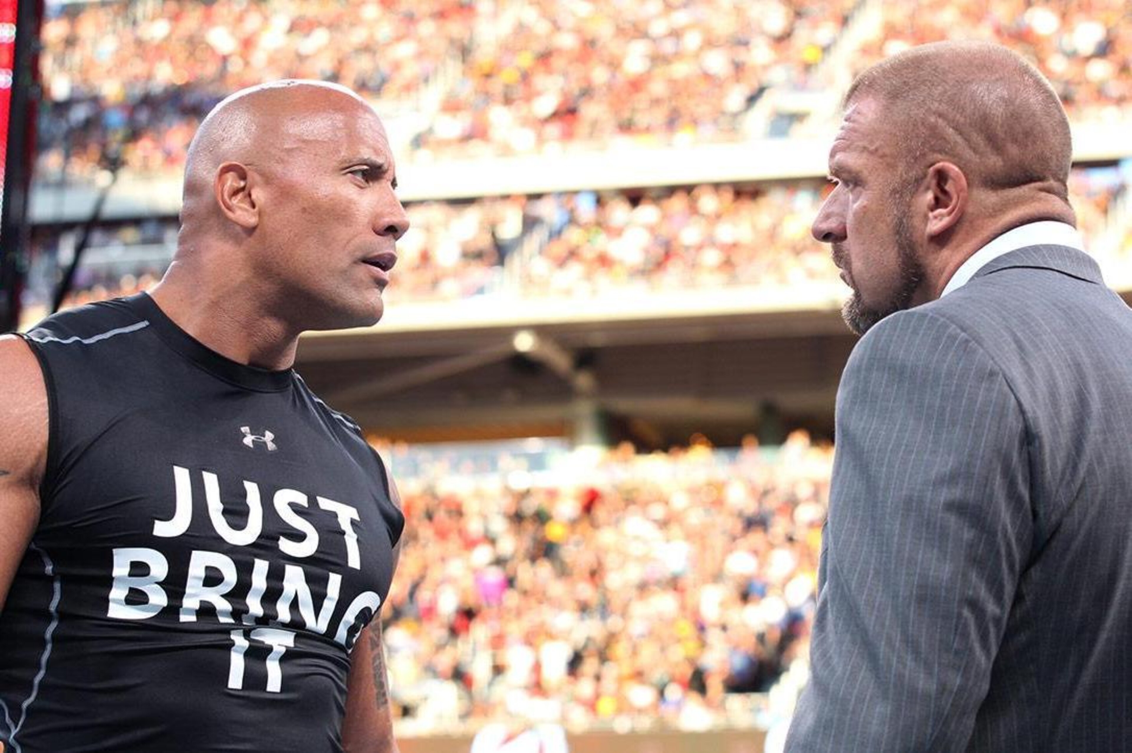 The Rock stares down with Triple H