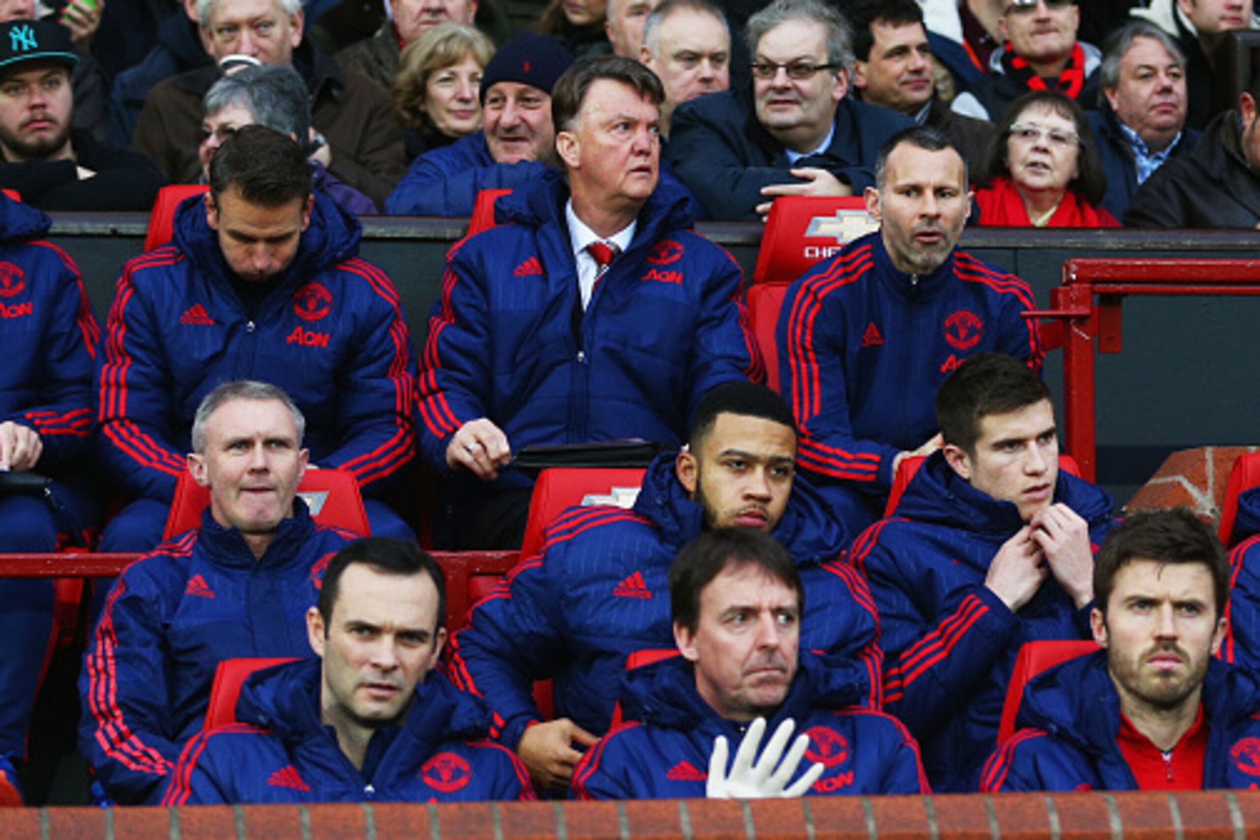 MANCHESTER, ENGLAND - JANUARY 02:  Louis van Gaal Manager and assistant manager Ryan Giggs are seen on the bench prior to the Barclays Premier League match between Manchester United and Swansea City at Old Trafford on January 2, 2016 in Manchester, Englan