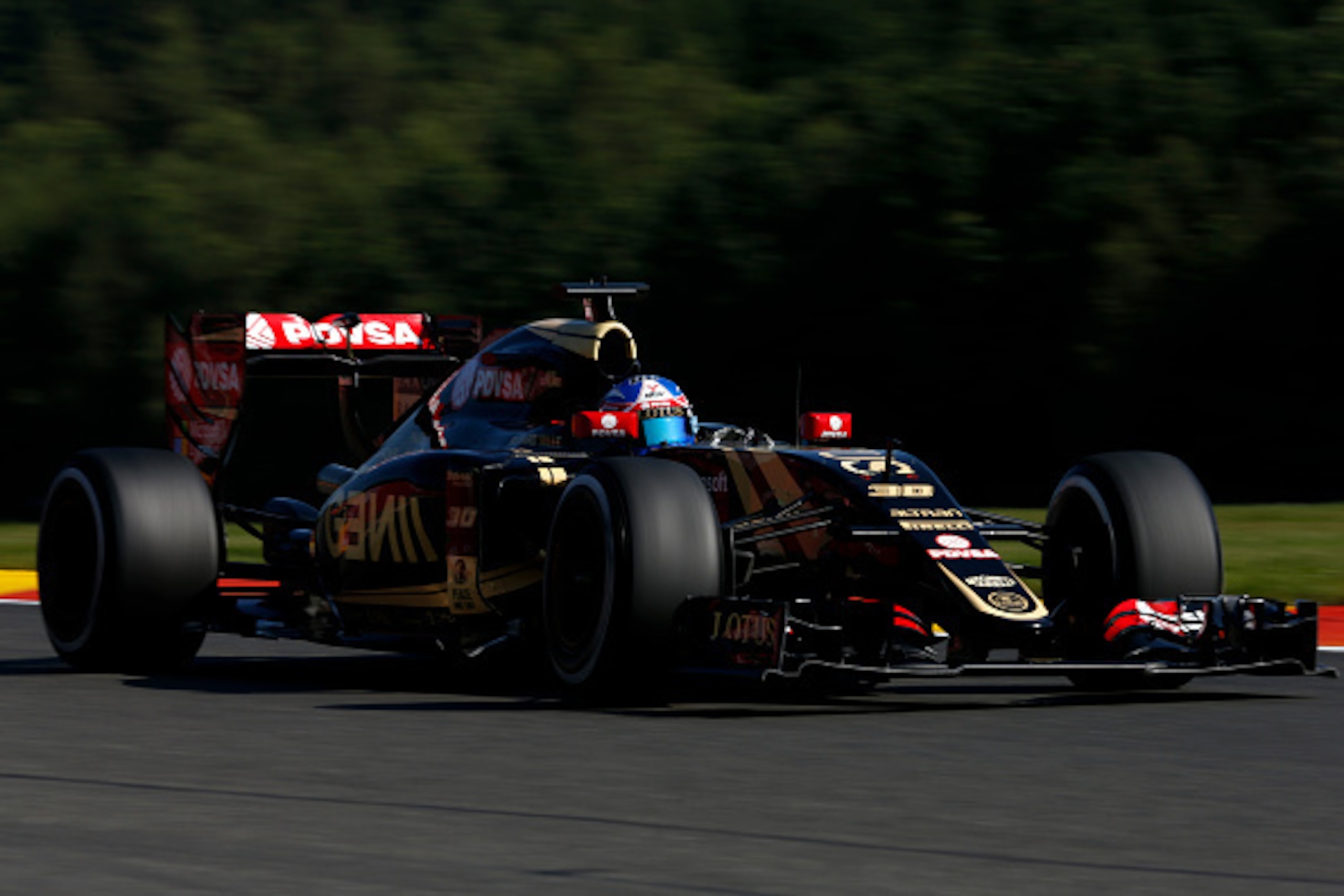 SPA, BELGIUM - AUGUST 21:  Jolyon Palmer of Great Britain and Lotus drives during practice for the Formula One Grand Prix of Belgium at Circuit de Spa-Francorchamps on August 21, 2015 in Spa, Belgium.  (Photo by Charles Coates/Getty Images)