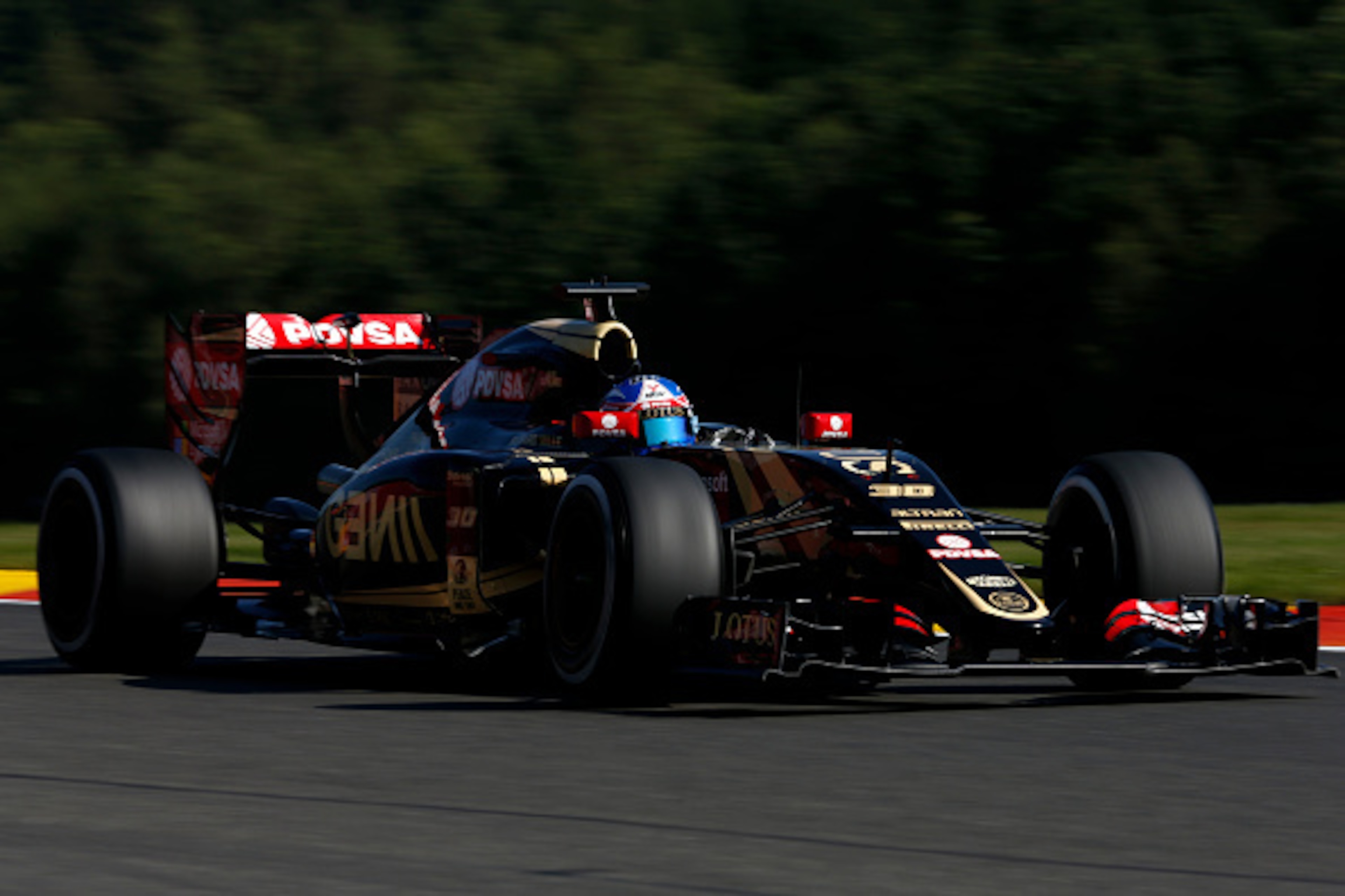 SPA, BELGIUM - AUGUST 21:  Jolyon Palmer of Great Britain and Lotus drives during practice for the Formula One Grand Prix of Belgium at Circuit de Spa-Francorchamps on August 21, 2015 in Spa, Belgium.  (Photo by Charles Coates/Getty Images)