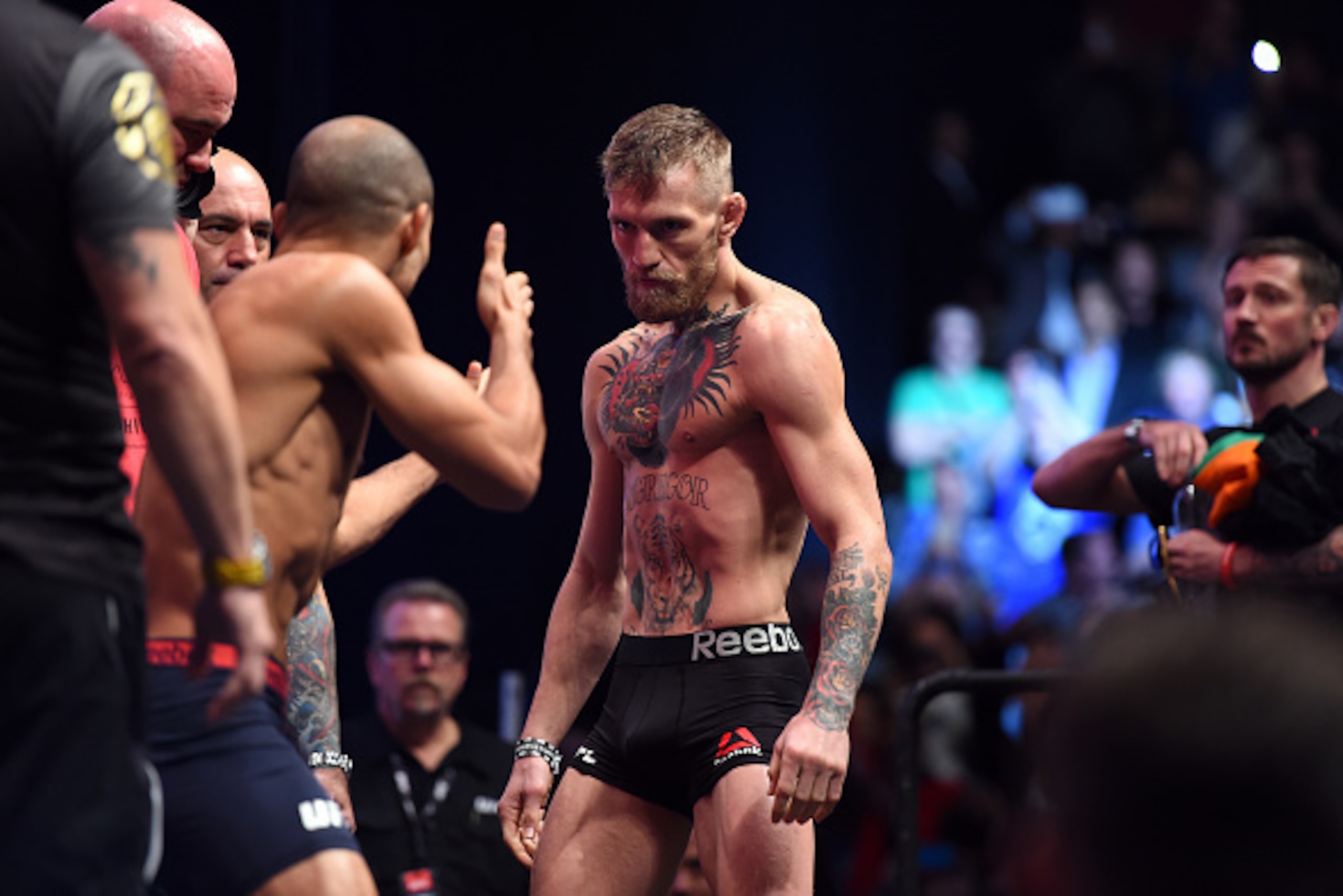 LAS VEGAS, NEVADA - DECEMBER 11:  UFC featherweight champion Jose Aldo of Brazil (L) faces off against Conor McGregor of Ireland (R) during the UFC 194 Weigh-in event at the MGM Grand Garden Arena on December 11, 2015 in Las Vegas, Nevada.  (Photo by Jeff