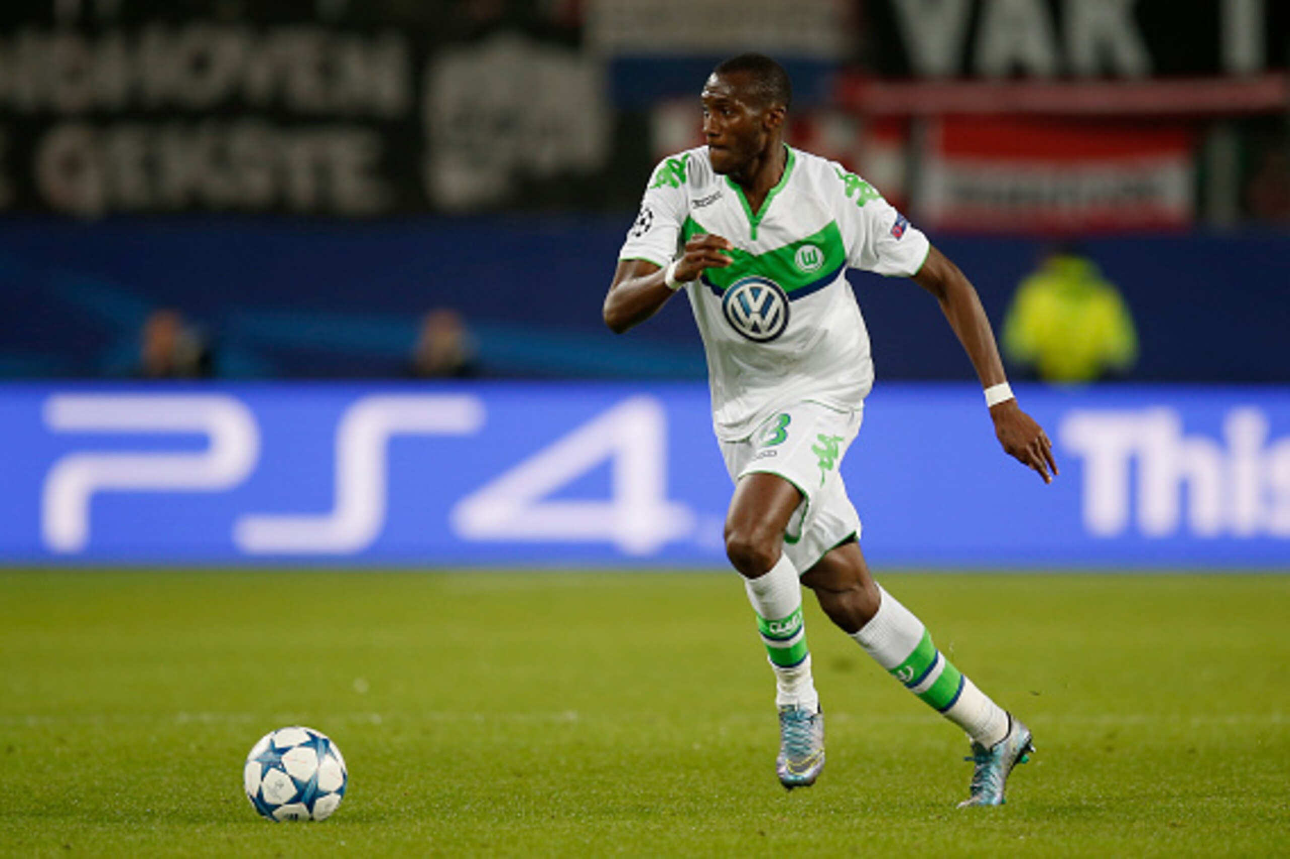 WOLFSBURG, GERMANY - OCTOBER 21: Josuha Guilavogui of VfL Wolfsburg runs with the ball during the UEFA Champions League Group B match between VfL Wolfsburg and PSV Eindhoven at Volkswagen Arena on October 21, 2015 in Wolfsburg, Germany.  (Photo by Boris S