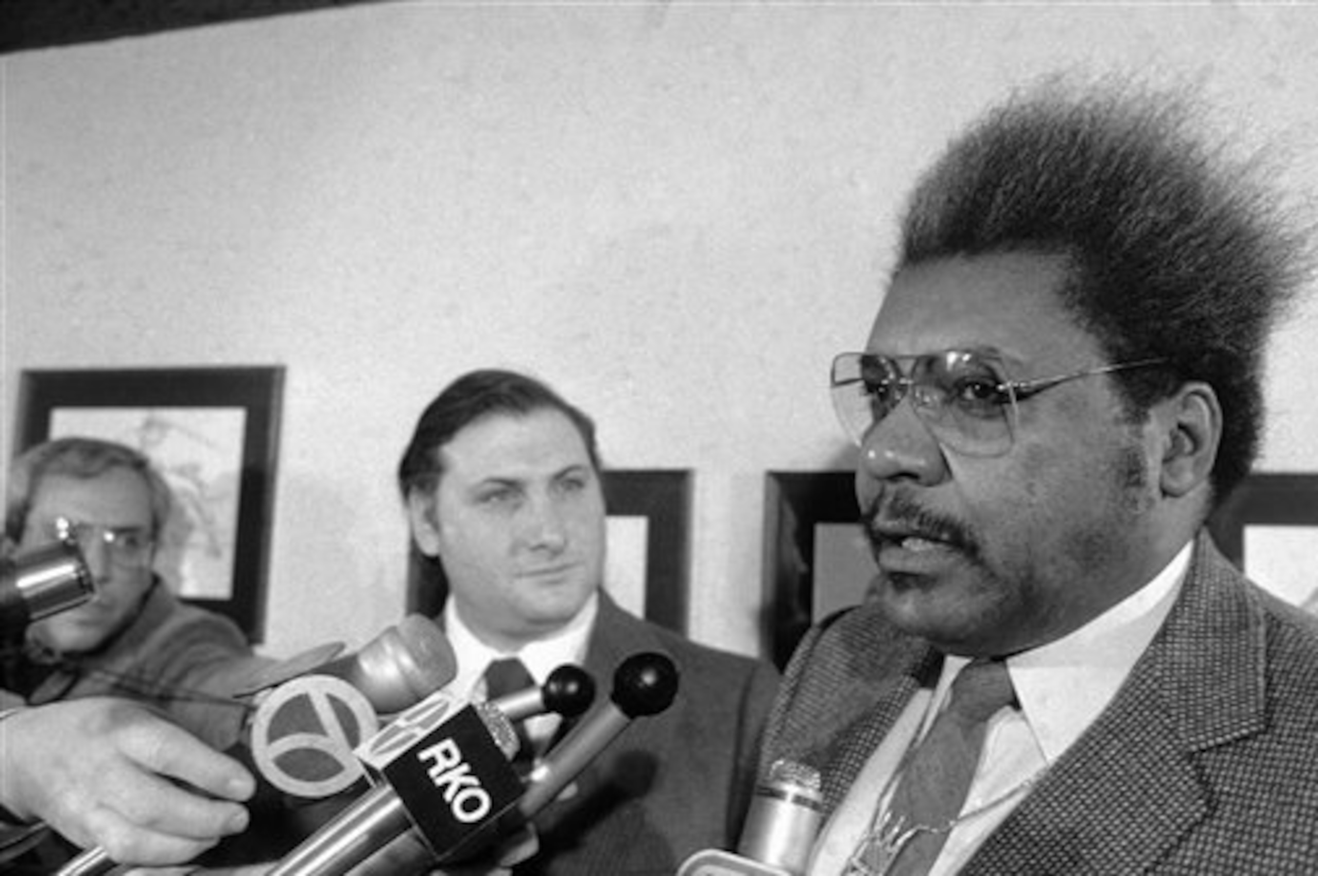 Don King promoting Cooney's fight with Larry Holmes.