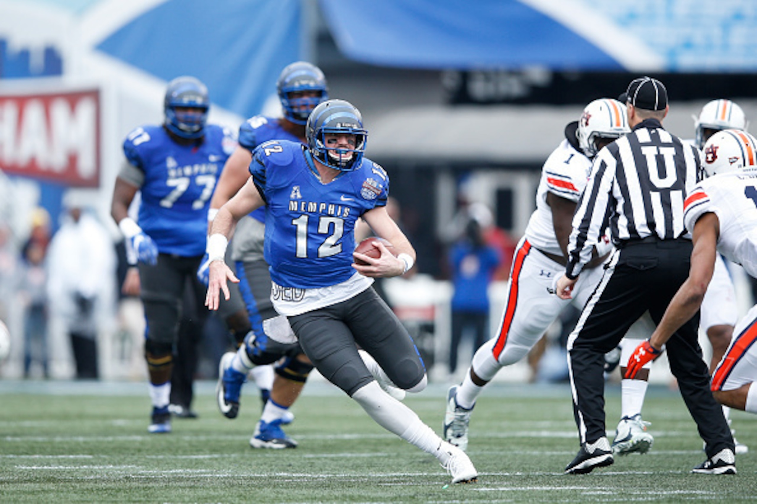 BIRMINGHAM, AL - DECEMBER 30: Paxton Lynch #12 of the Memphis Tigers runs with the ball against the Auburn Tigers during the Birmingham Bowl at Legion Field on December 30, 2015 in Birmingham, Alabama. Auburn defeated Memphis 31-10. (Photo by Joe Robbins/ BIRMINGHAM, AL - DECEMBER 30: Paxton Lynch #12 of the Memphis Tigers runs with the ball against the Auburn Tigers during the Birmingham Bowl at Legion Field on December 30, 2015 in Birmingham, Alabama. Auburn defeated Memphis 31-10. (Photo by Joe Robbins/
