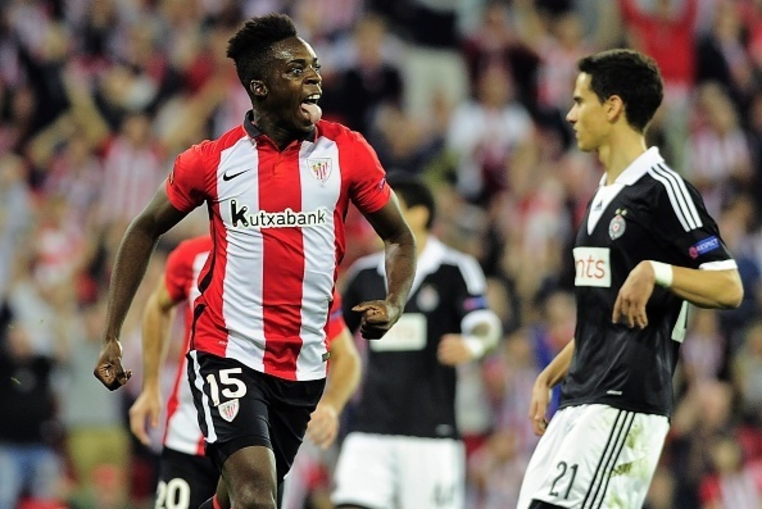 Athletic Bilbao's forward Inaki Williams Arthuer (L) celebrates after scoring during the UEFA Europa League group L football match Athletic Club Bilbao vs FK Partizan at the San Mames stadium in Bilbao on November 5, 2015.   AFP PHOTO/ ANDER GILLENEA     