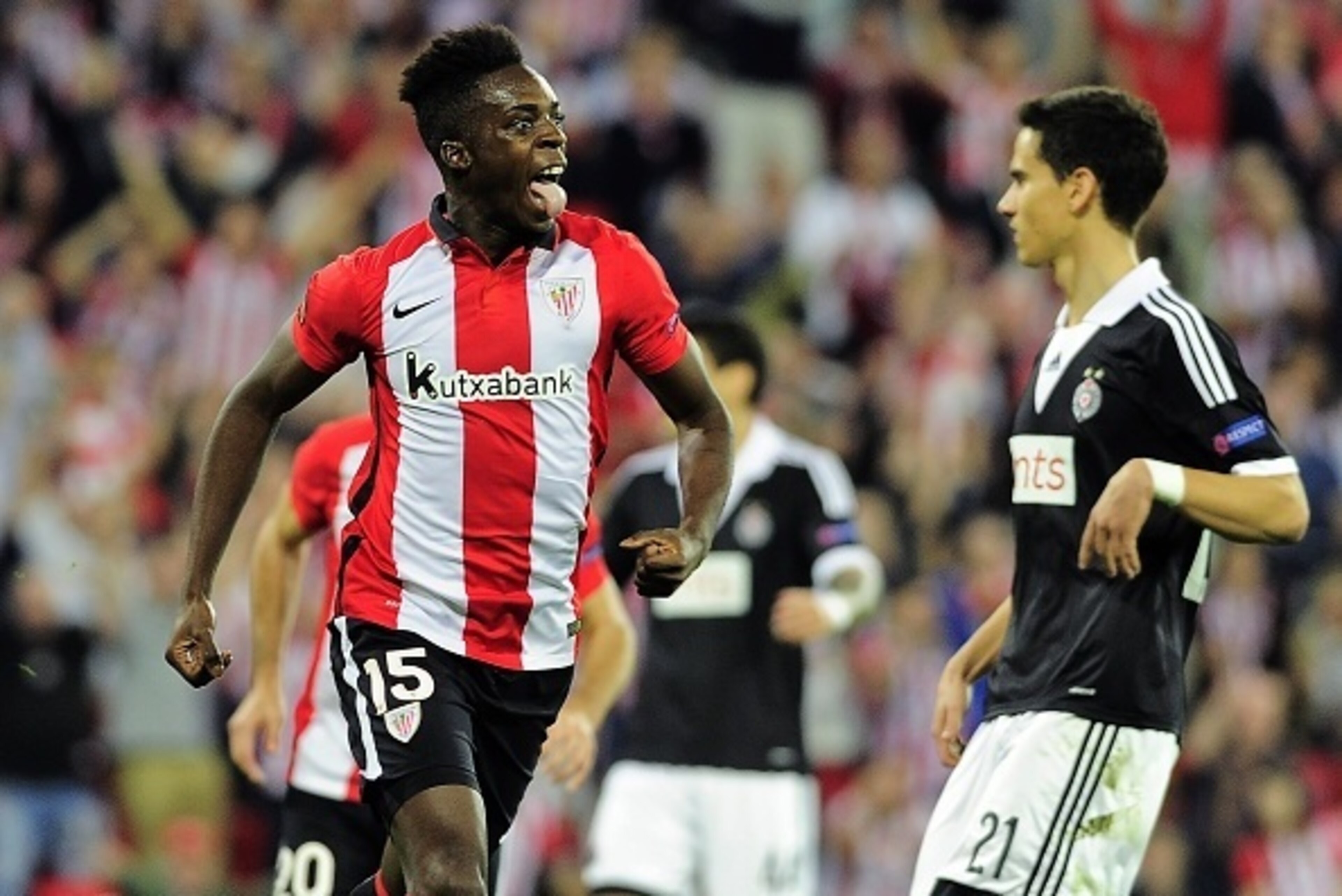 Athletic Bilbao's forward Inaki Williams Arthuer (L) celebrates after scoring during the UEFA Europa League group L football match Athletic Club Bilbao vs FK Partizan at the San Mames stadium in Bilbao on November 5, 2015.   AFP PHOTO/ ANDER GILLENEA     