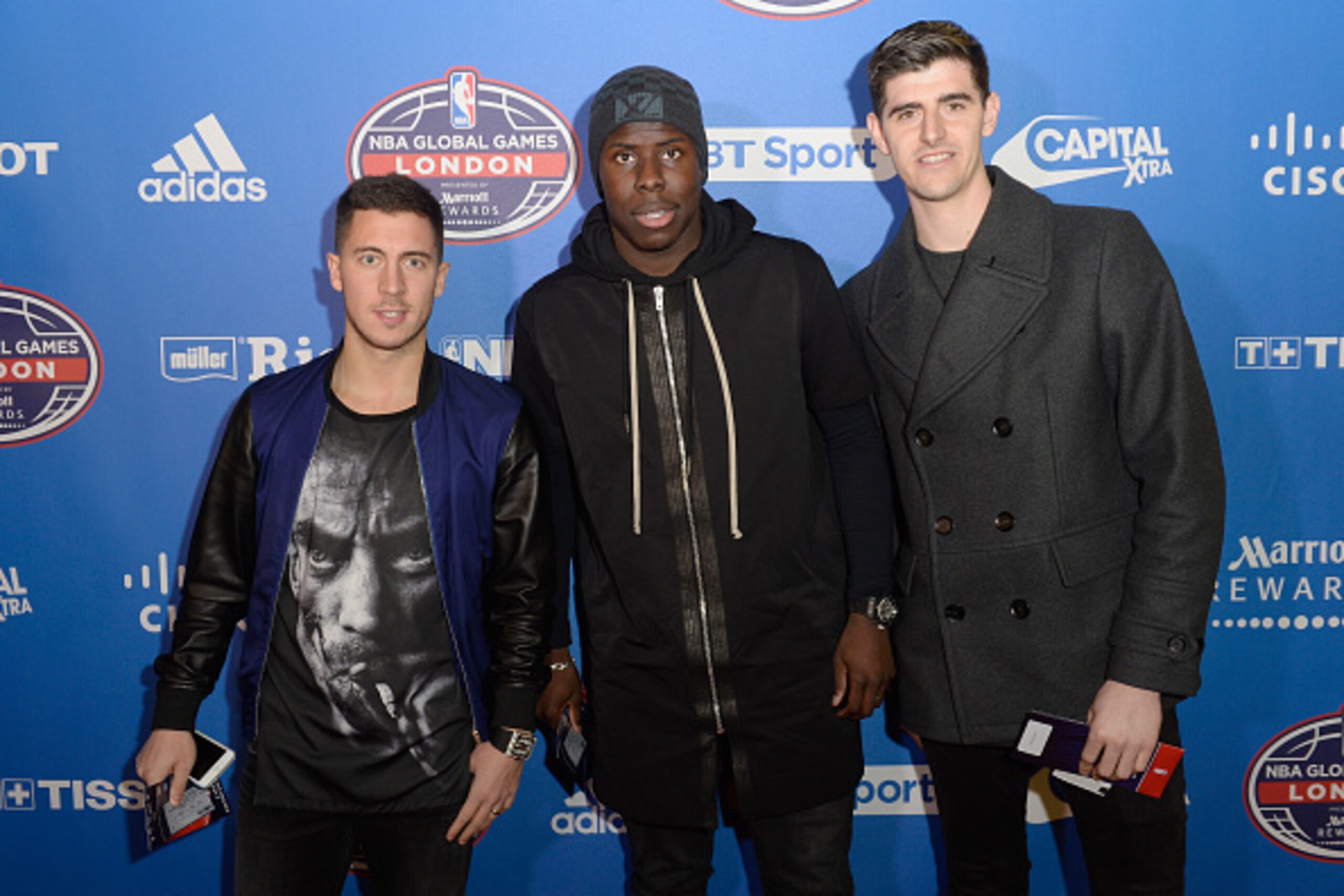 LONDON, ENGLAND - JANUARY 14:  Eden Hazard, Kurt Zouma and Thibaut Courtois attend Orlando Magic vs Toronto Raptors NBA Global Game at The O2 Arena on January 14, 2016 in London, England.  (Photo by David M. Benett/Dave Benett/Getty Images for NBA)