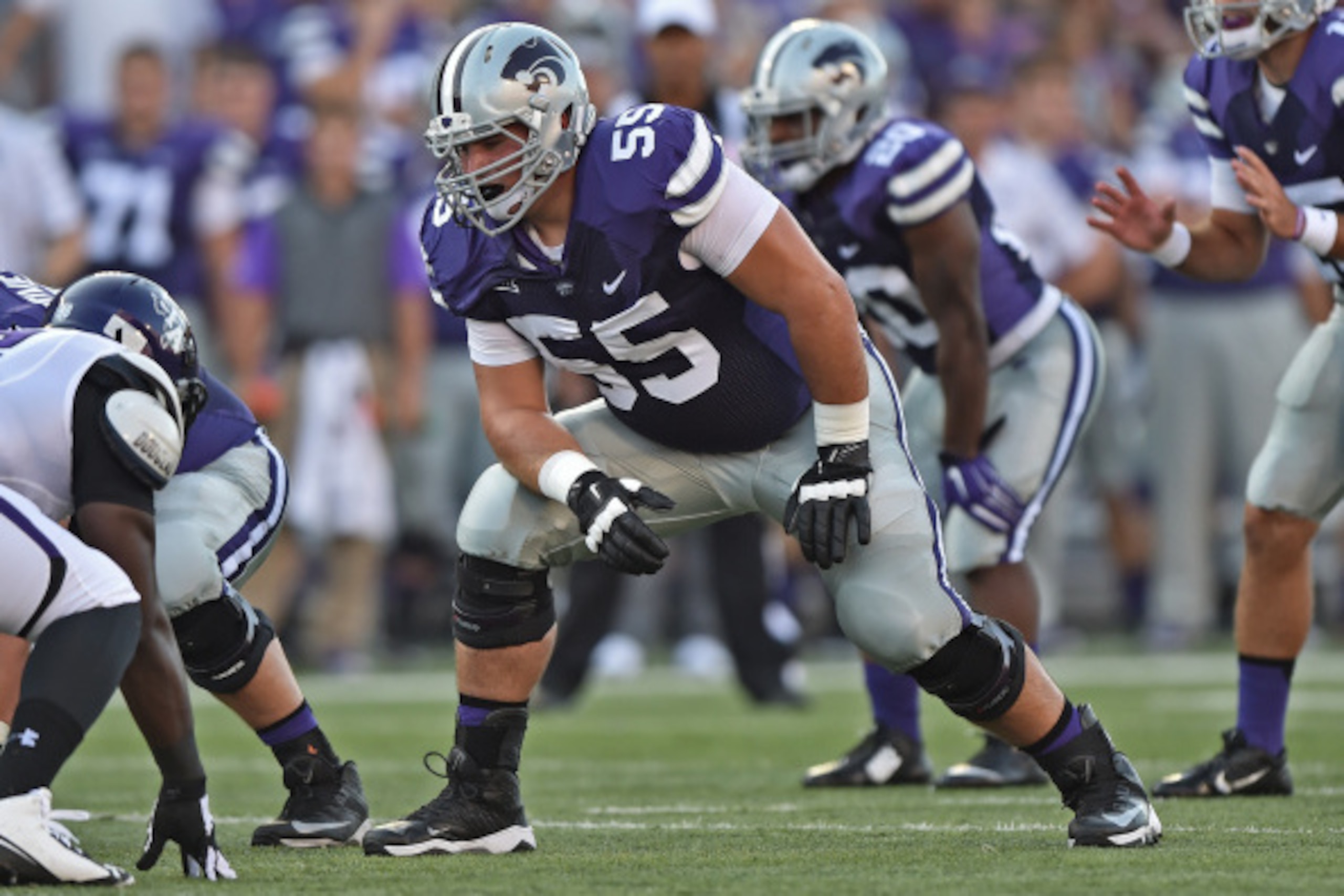 MANHATTAN, KS - AUGUST 30: Offensive tackle Cody Whitehair #55 of the Kansas State Wildcats gets set on offense against the Stephen F. Austin Lumberjacks during the first half on August 30, 2014 at Bill Snyder Family Stadium in Manhattan, Kansas. (Photo MANHATTAN, KS - AUGUST 30: Offensive tackle Cody Whitehair #55 of the Kansas State Wildcats gets set on offense against the Stephen F. Austin Lumberjacks during the first half on August 30, 2014 at Bill Snyder Family Stadium in Manhattan, Kansas. (Photo