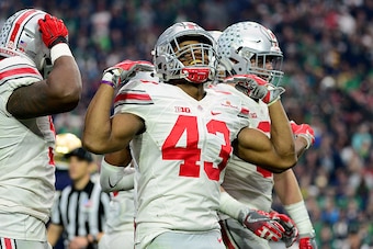 GLENDALE, AZ - JANUARY 01:  Linebacker Darron Lee #43 of the Ohio State Buckeyes celebrates during the fourth quarter of the BattleFrog Fiesta Bowl against the Notre Dame Fighting Irish at University of Phoenix Stadium on January 1, 2016 in Glendale, Ariz