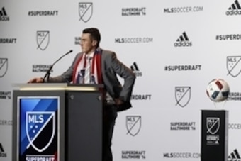 Jan 14, 2016; Baltimore, MD, USA; Jack Harrison shakes hands at the podium after being selected number one overall by the Chicago Fire during the 2016 MLS SuperDraft at Baltimore Convention Center. Mandatory Credit: Geoff Burke-USA TODAY Sports