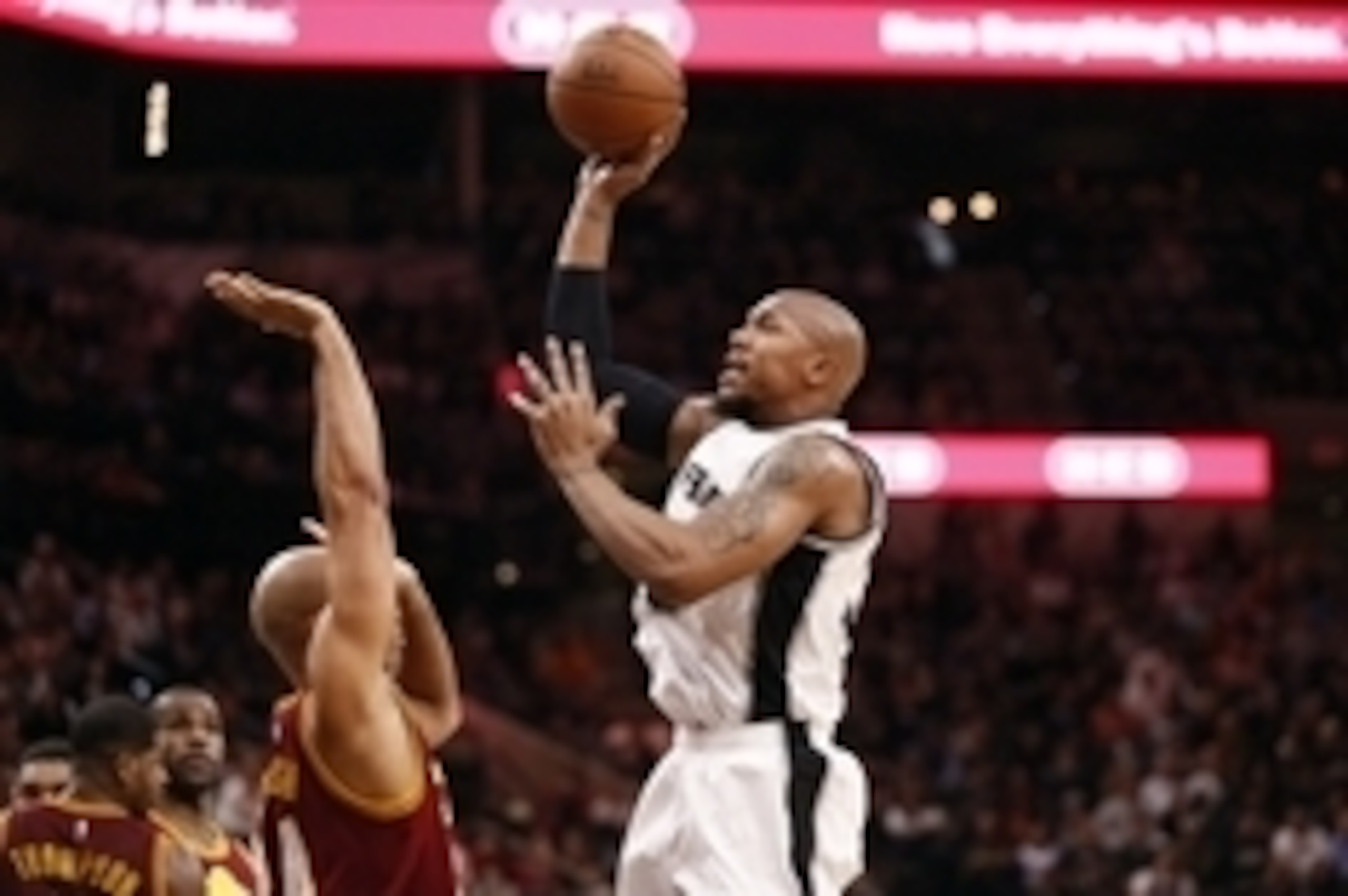 Jan 14, 2016; San Antonio, TX, USA; San Antonio Spurs power forward David West (30) shoots the ball over Cleveland Cavaliers small forward Richard Jefferson (24,left) during the first half at AT&T Center. Mandatory Credit: Soobum Im-USA TODAY Sports